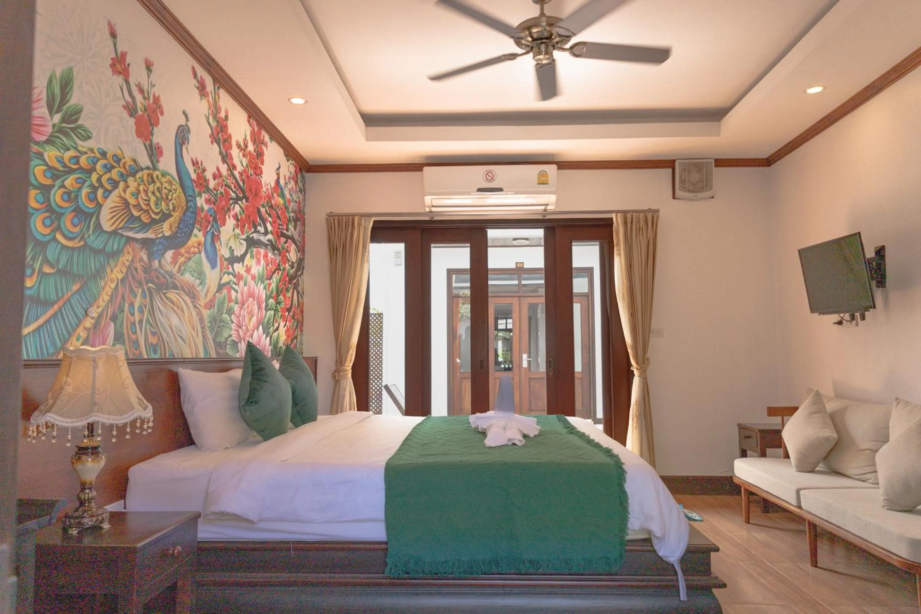 Photo of the whole room, Bed in Jasmine Luangprabang Hotel