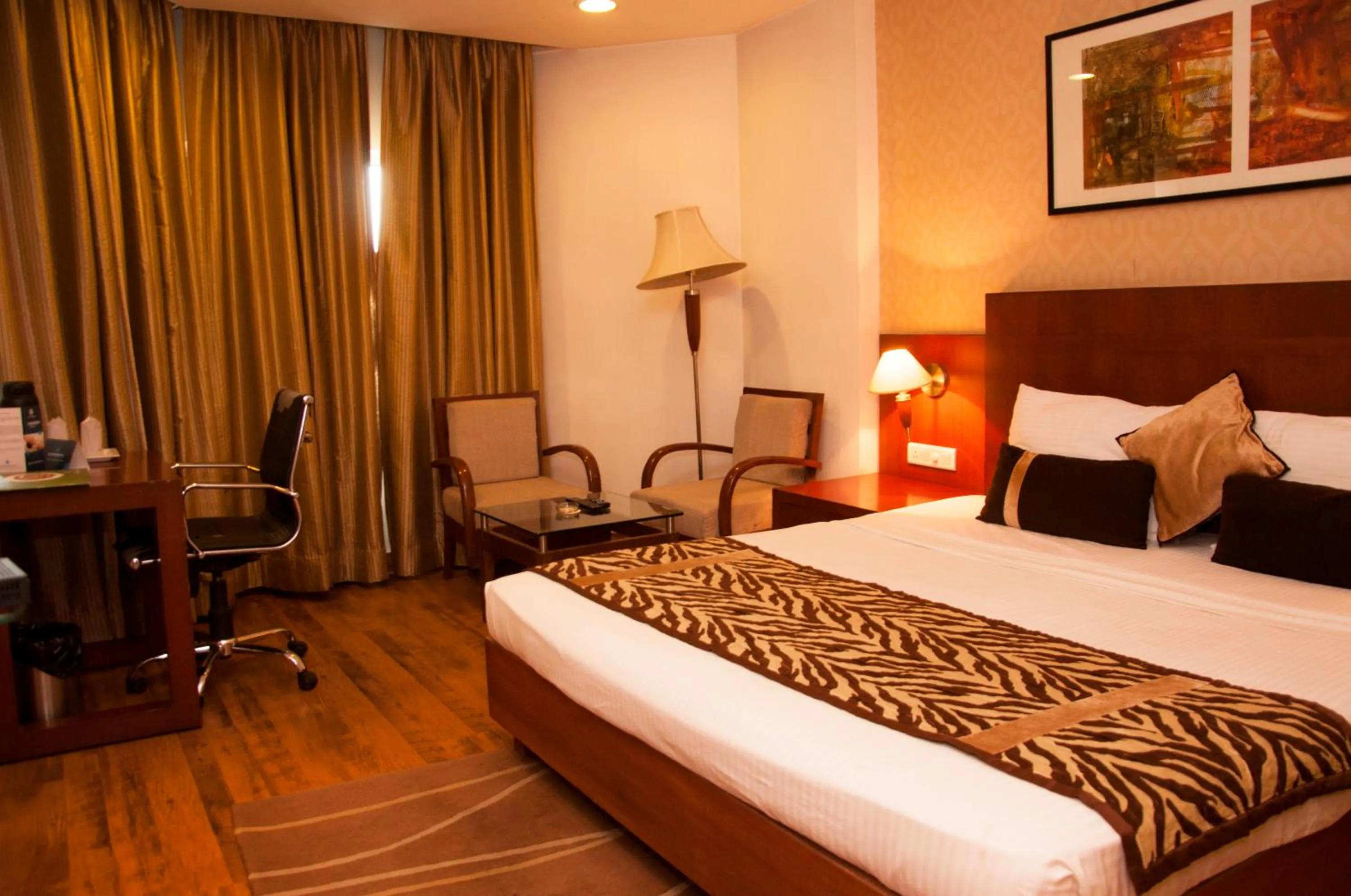 Bed in Hotel Gwalior Regency