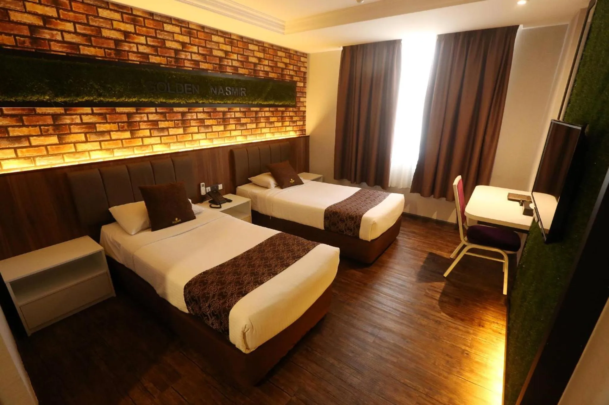 Bed in Golden Nasmir Hotel