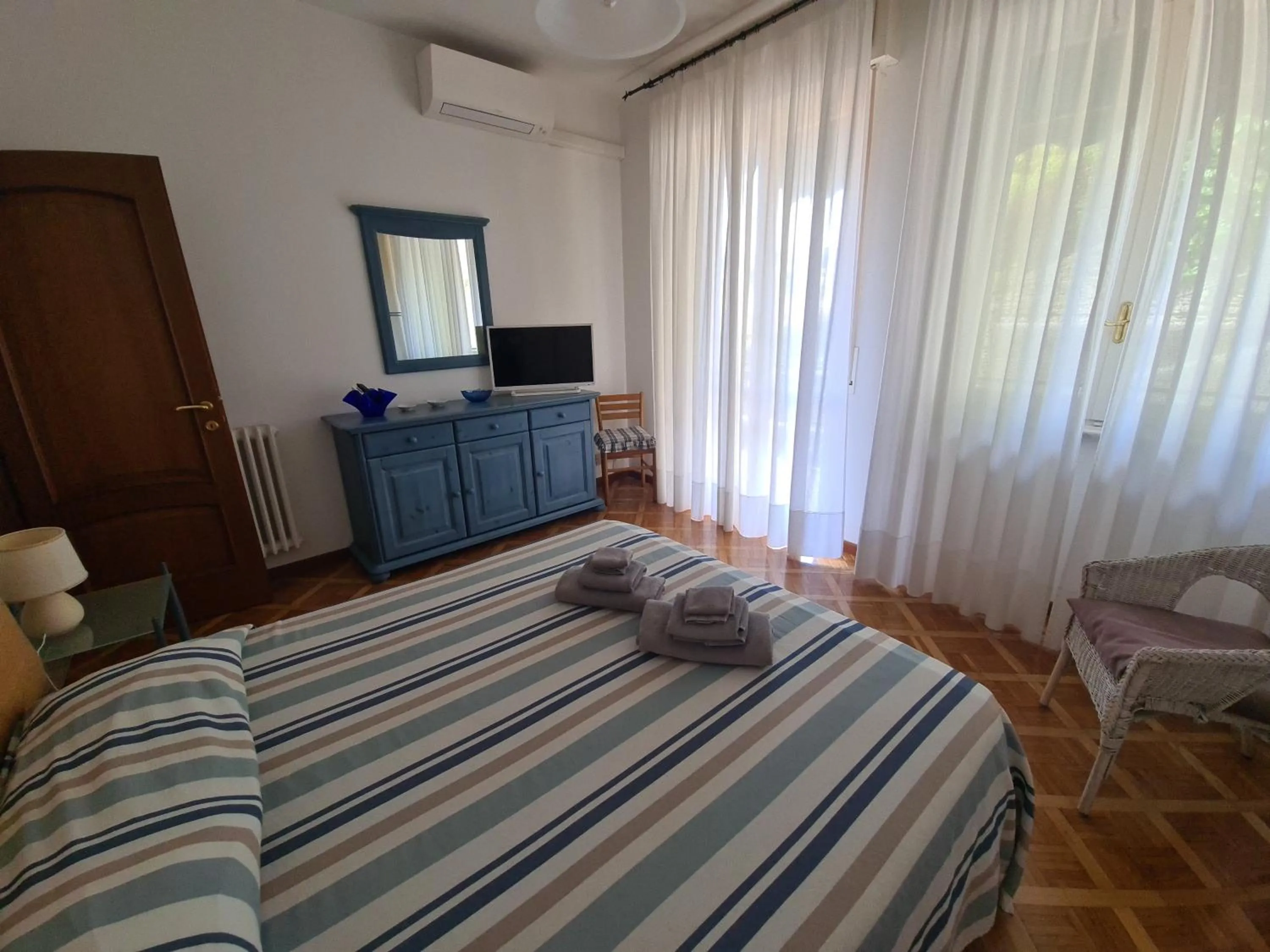 Bed in Turchino Apartment & Terrazza della Luisa by PortofinoVacanze