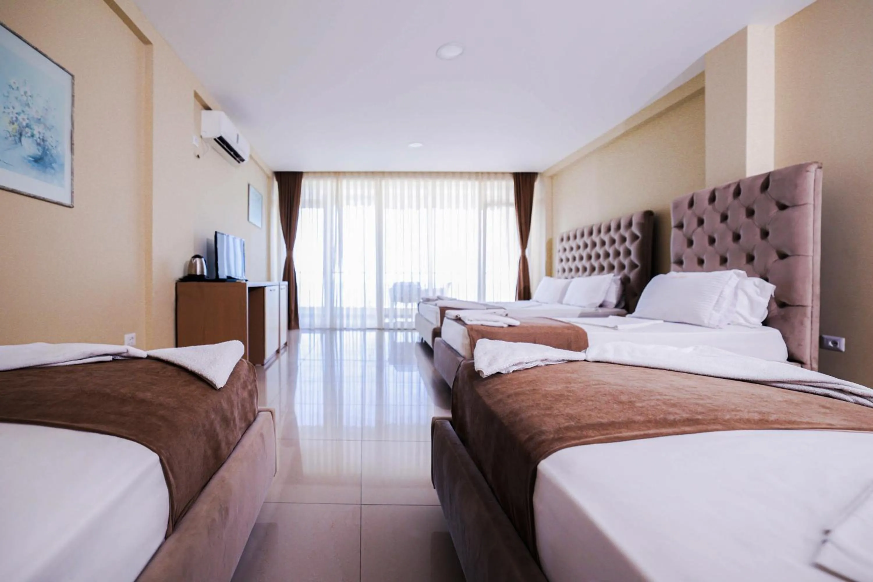 Family Room with Sea View in Hotel Frojd - Beach Front Resort