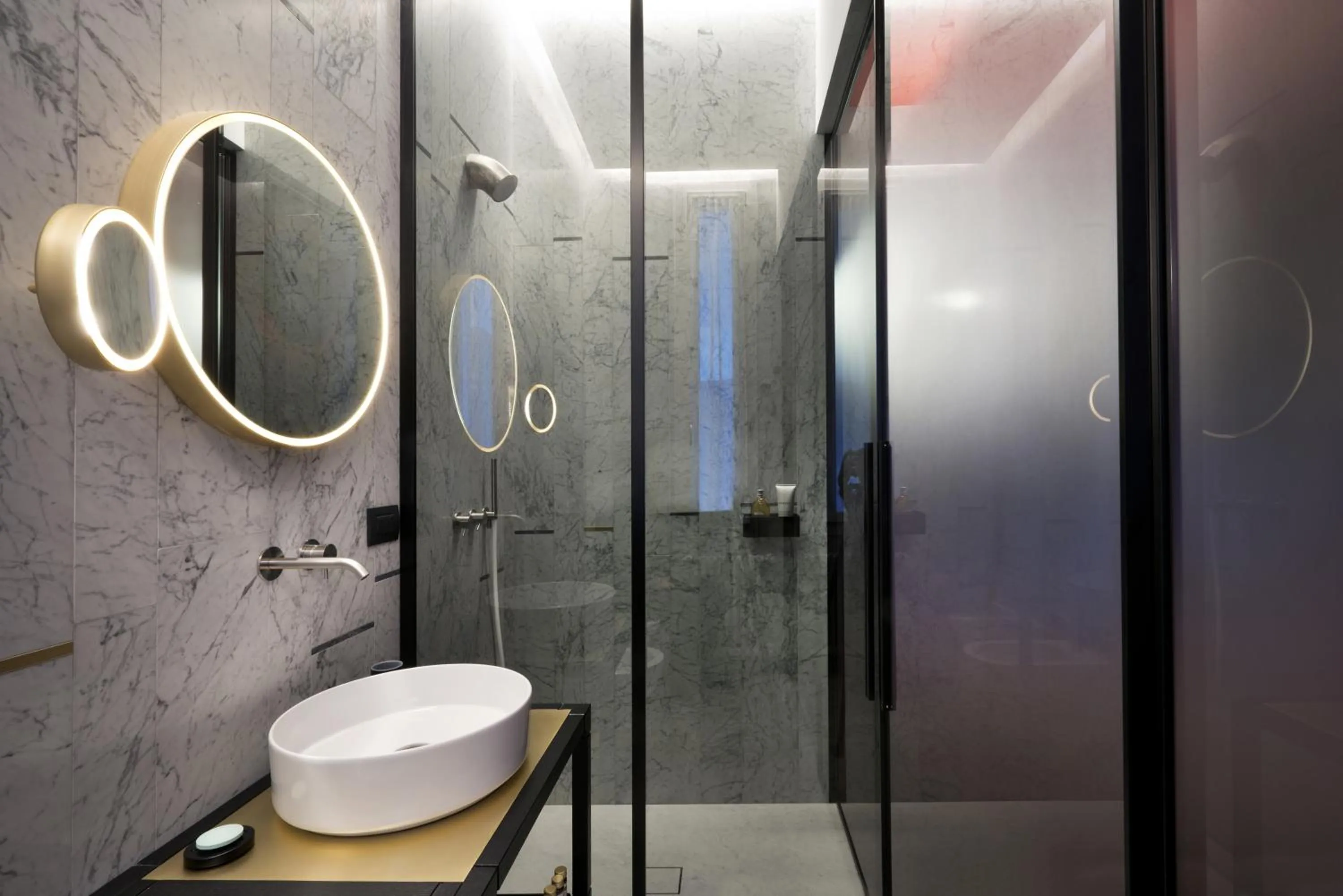 Shower in Conti Guest House