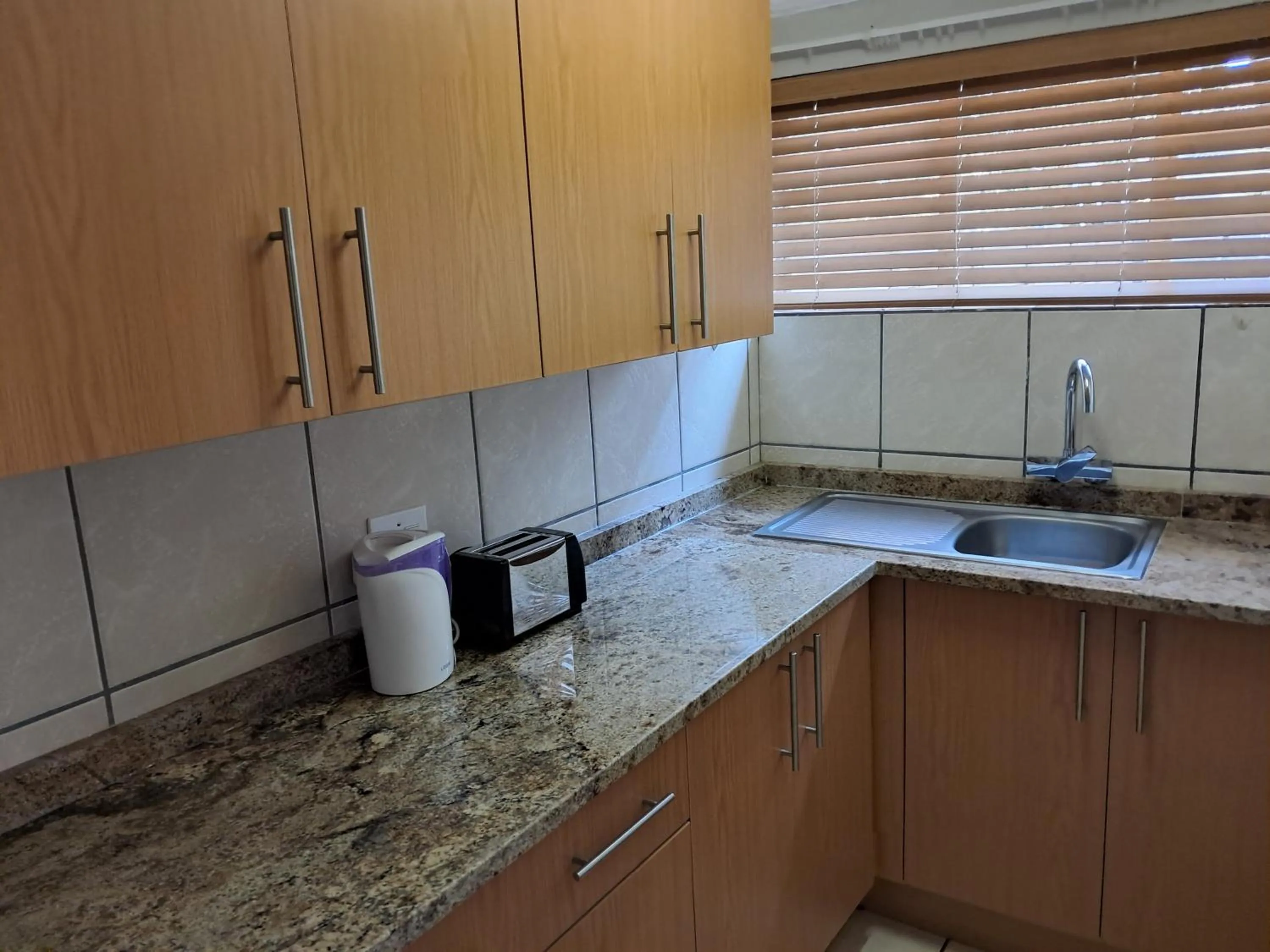 Kitchen or kitchenette in Jakkalsdraai Guest House