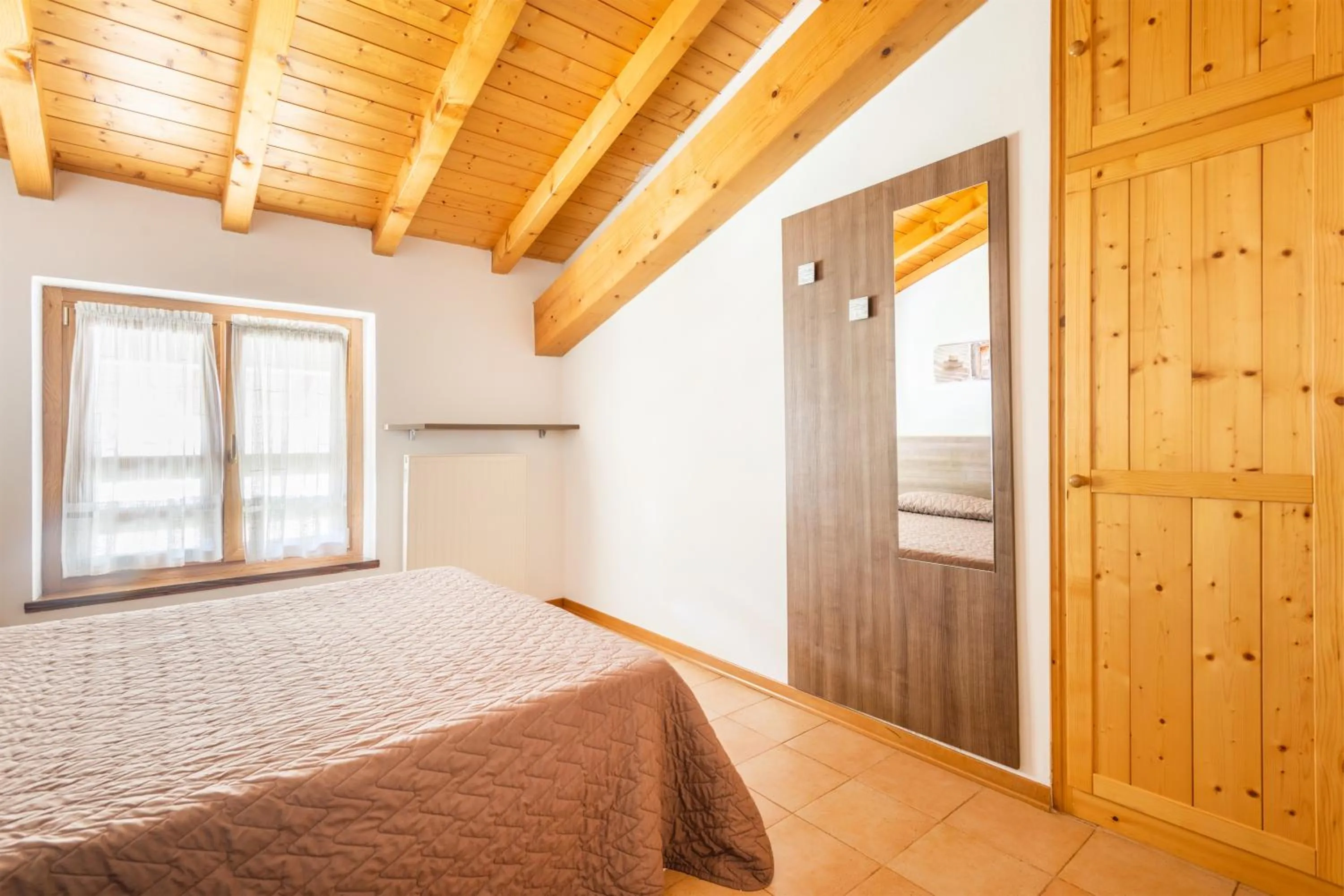 Photo of the whole room, Bed in CROSINA HOLIDAY - Casa Lucia