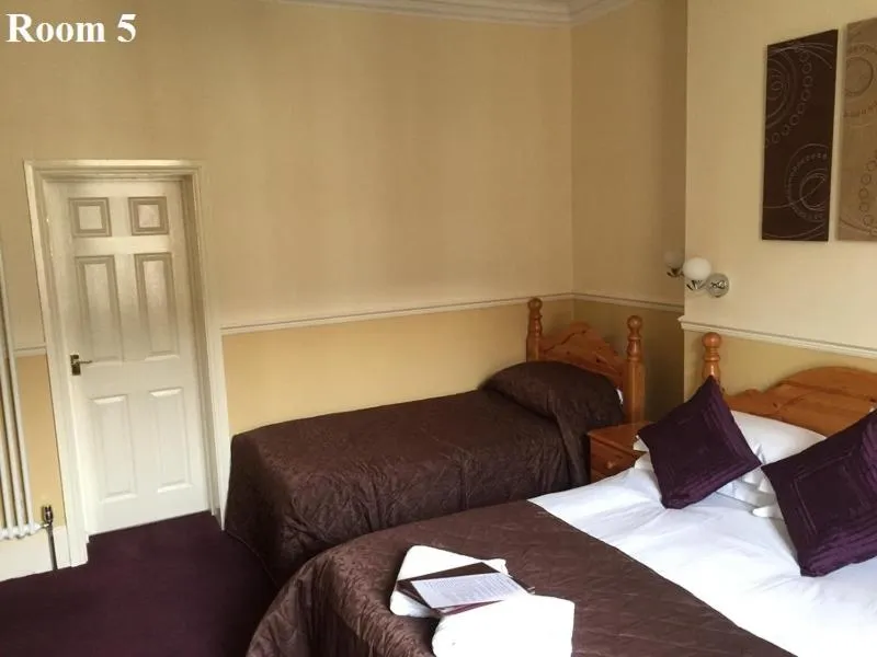 Bed in The Arches Guest House