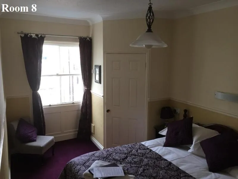 Bed in The Arches Guest House