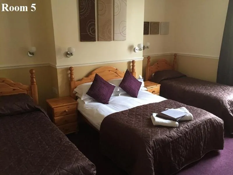 Bed in The Arches Guest House