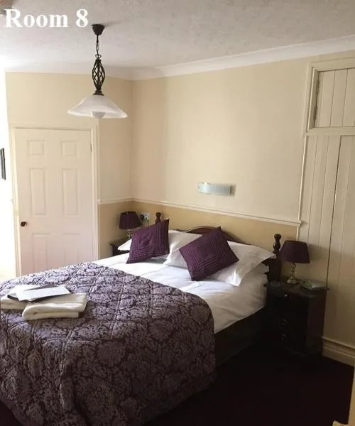 Bed in The Arches Guest House