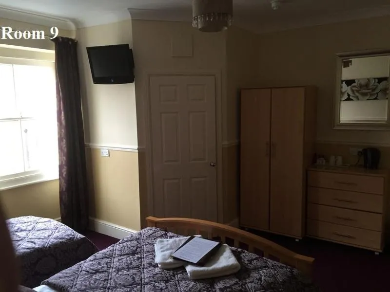 Bed in The Arches Guest House