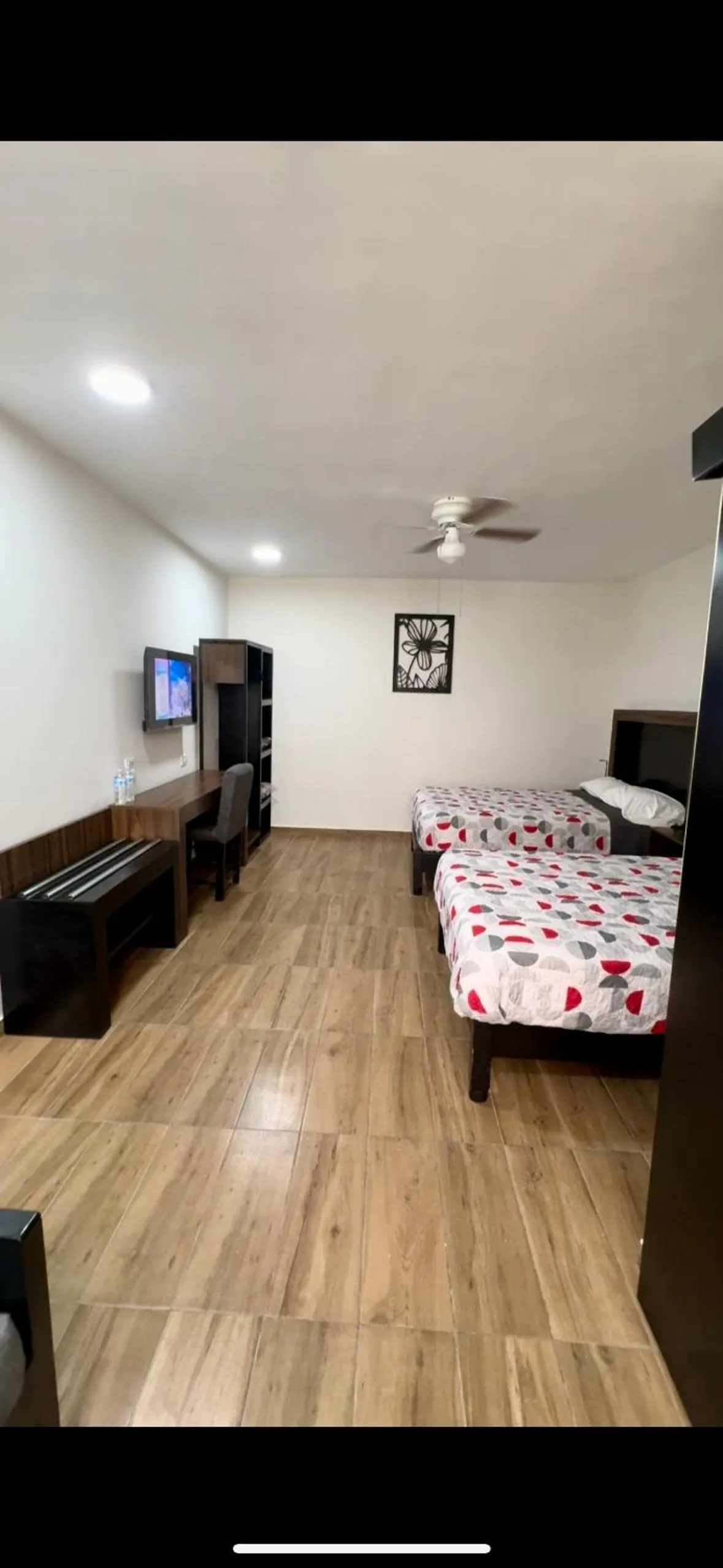 Bed in Hotel del Alba Inn & Suites