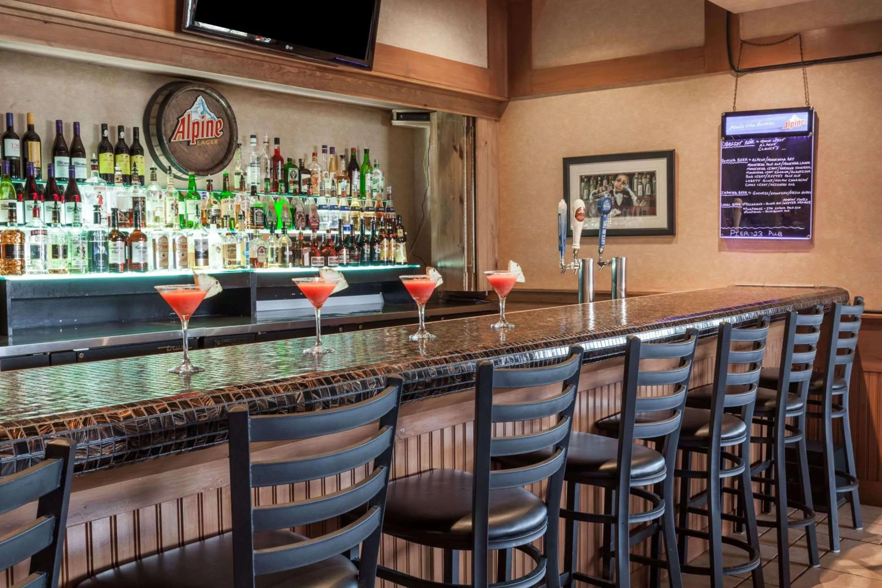 Lounge or bar in Ramada by Wyndham Fredericton