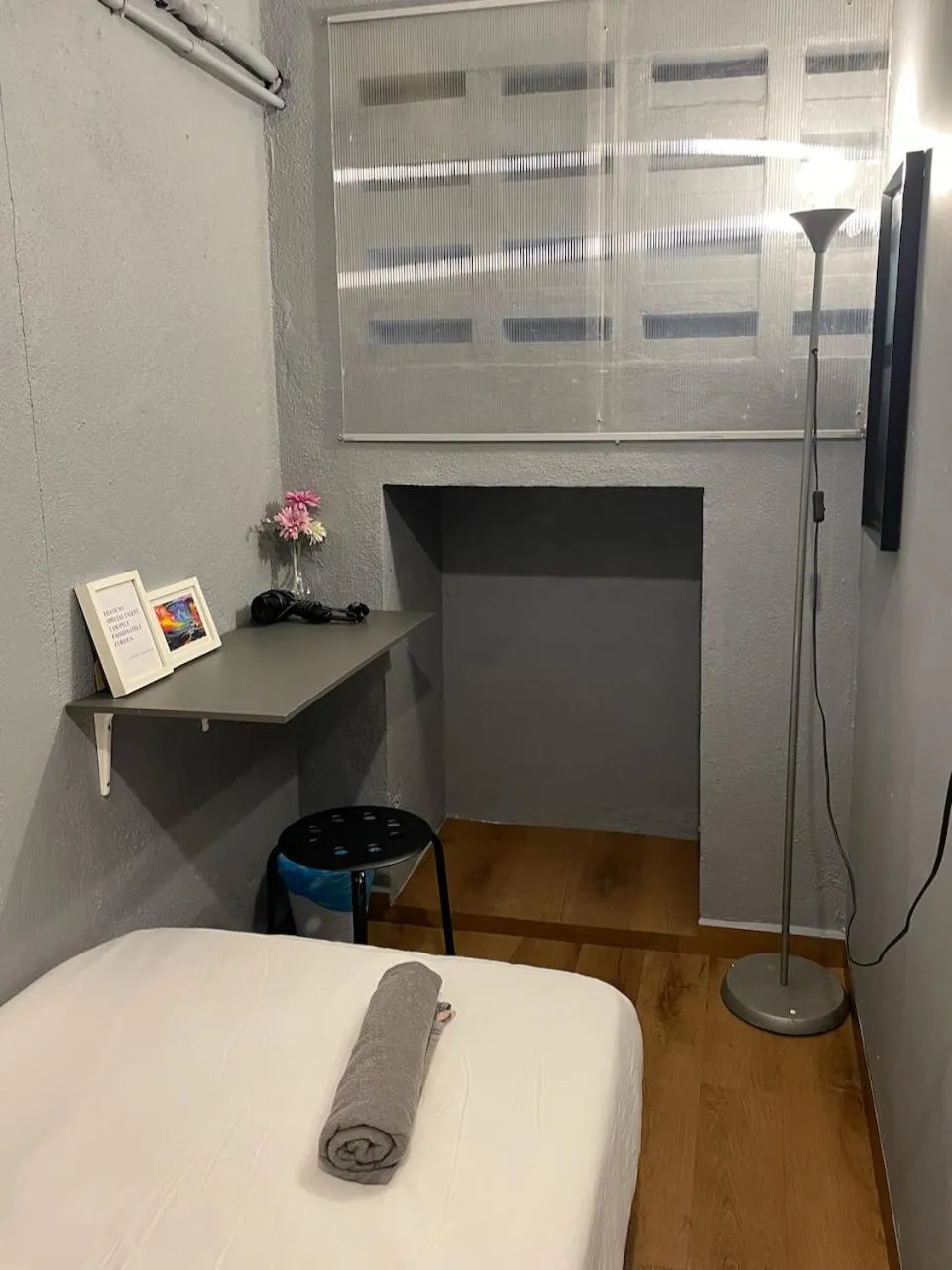 Bed in GRAYHAUS Guest House