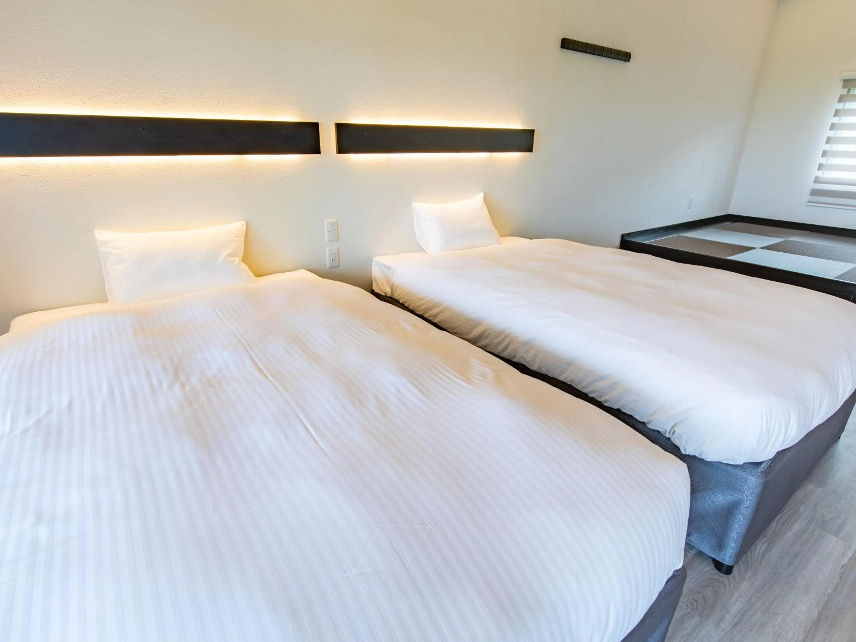 Bed in Nagahama Beach Resort Kanon