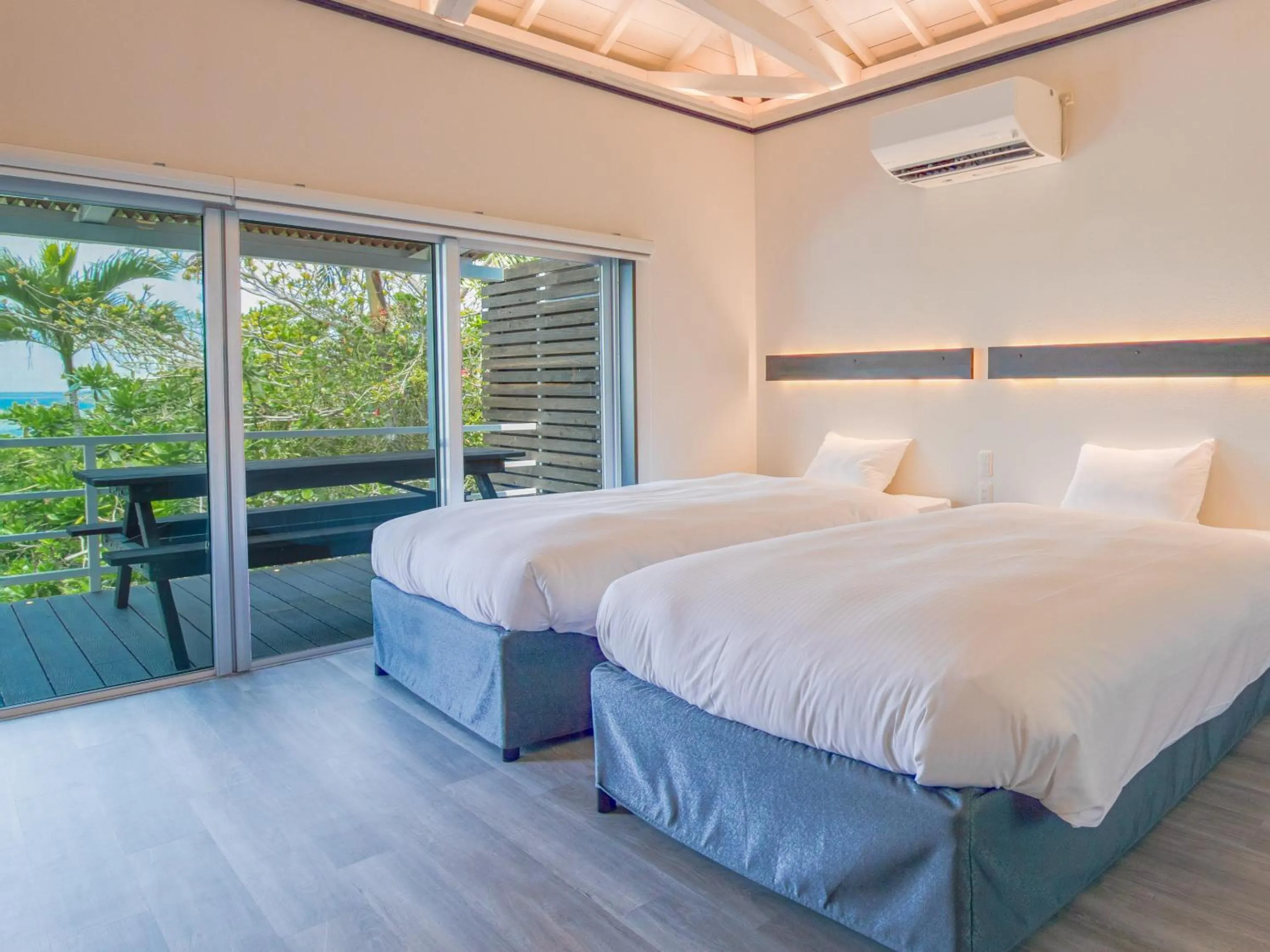 Bed in Nagahama Beach Resort Kanon