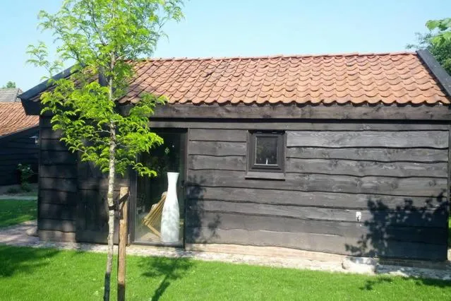 Garden in Vakantiehuisje met bedstee