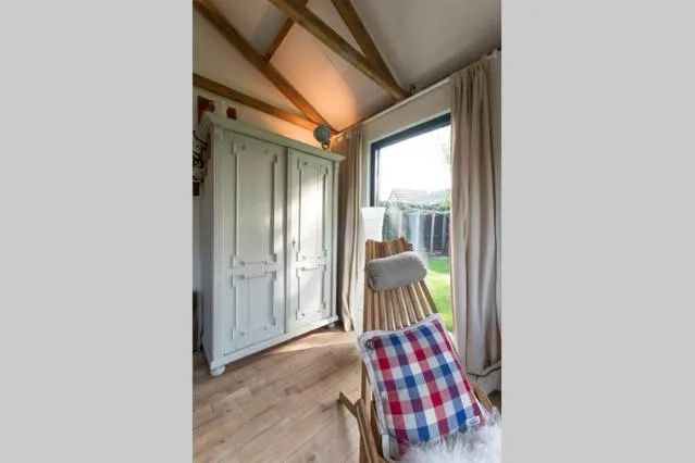 Living room in Vakantiehuisje met bedstee