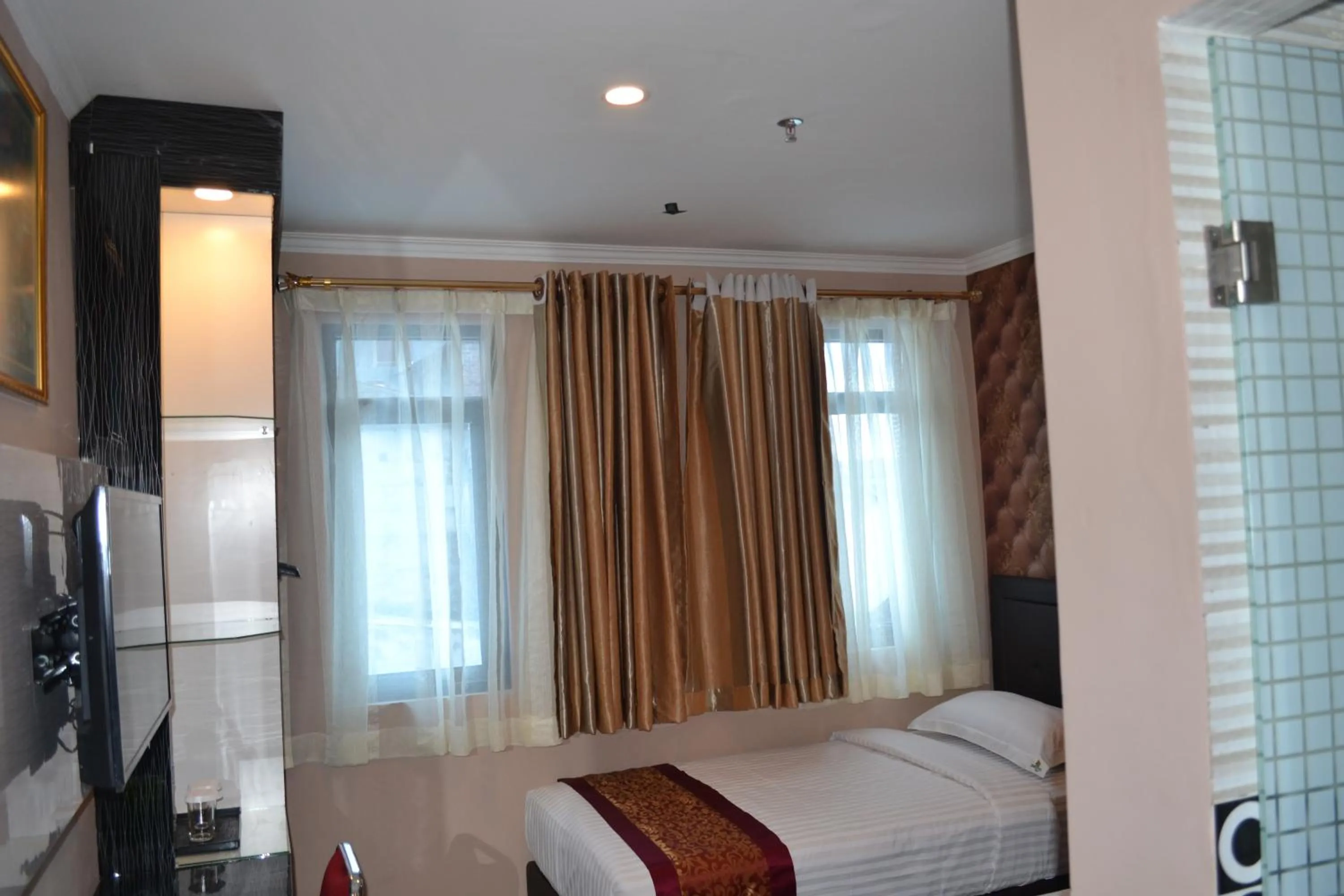 Bedroom, Bed in Puncak Budget Hotel