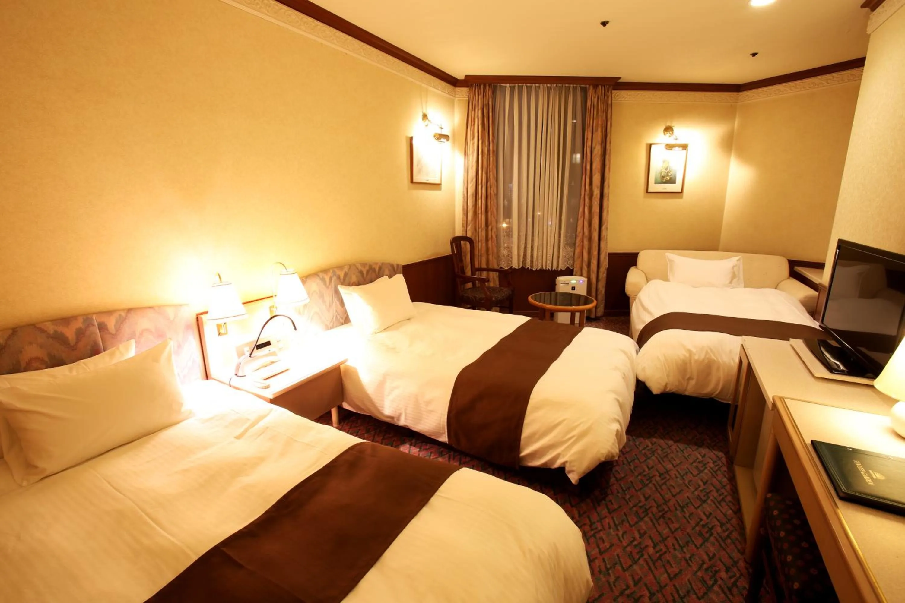 Photo of the whole room, Bed in Hotel Sunlife Garden