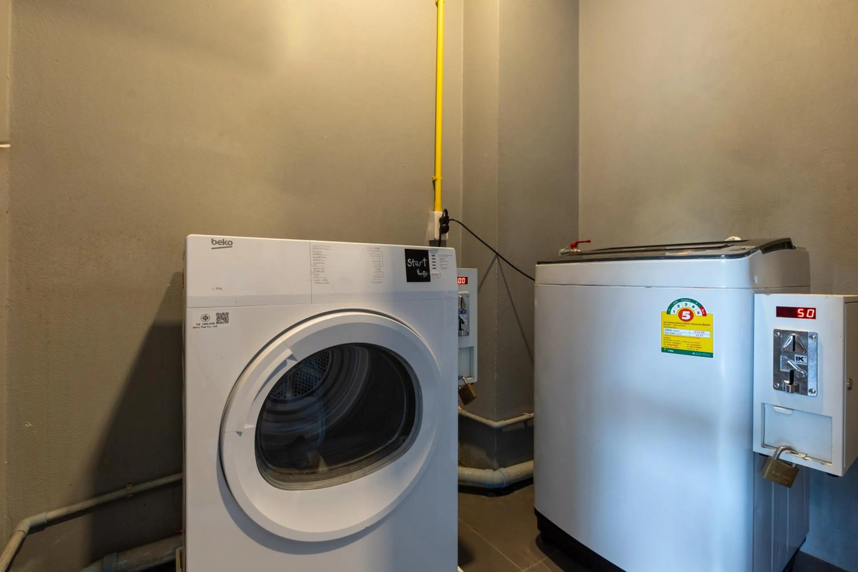 washing machine in Wake Up Aonang Hotel