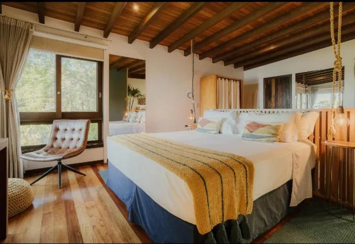 Bed in Villa Gardena Suites