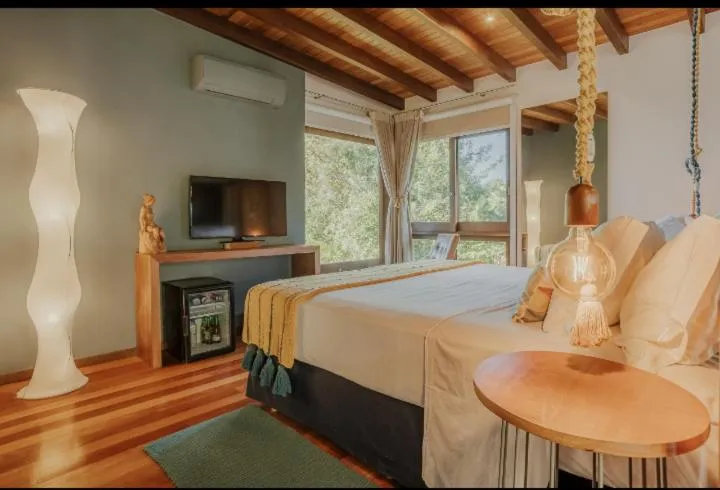 Bed in Villa Gardena Suites