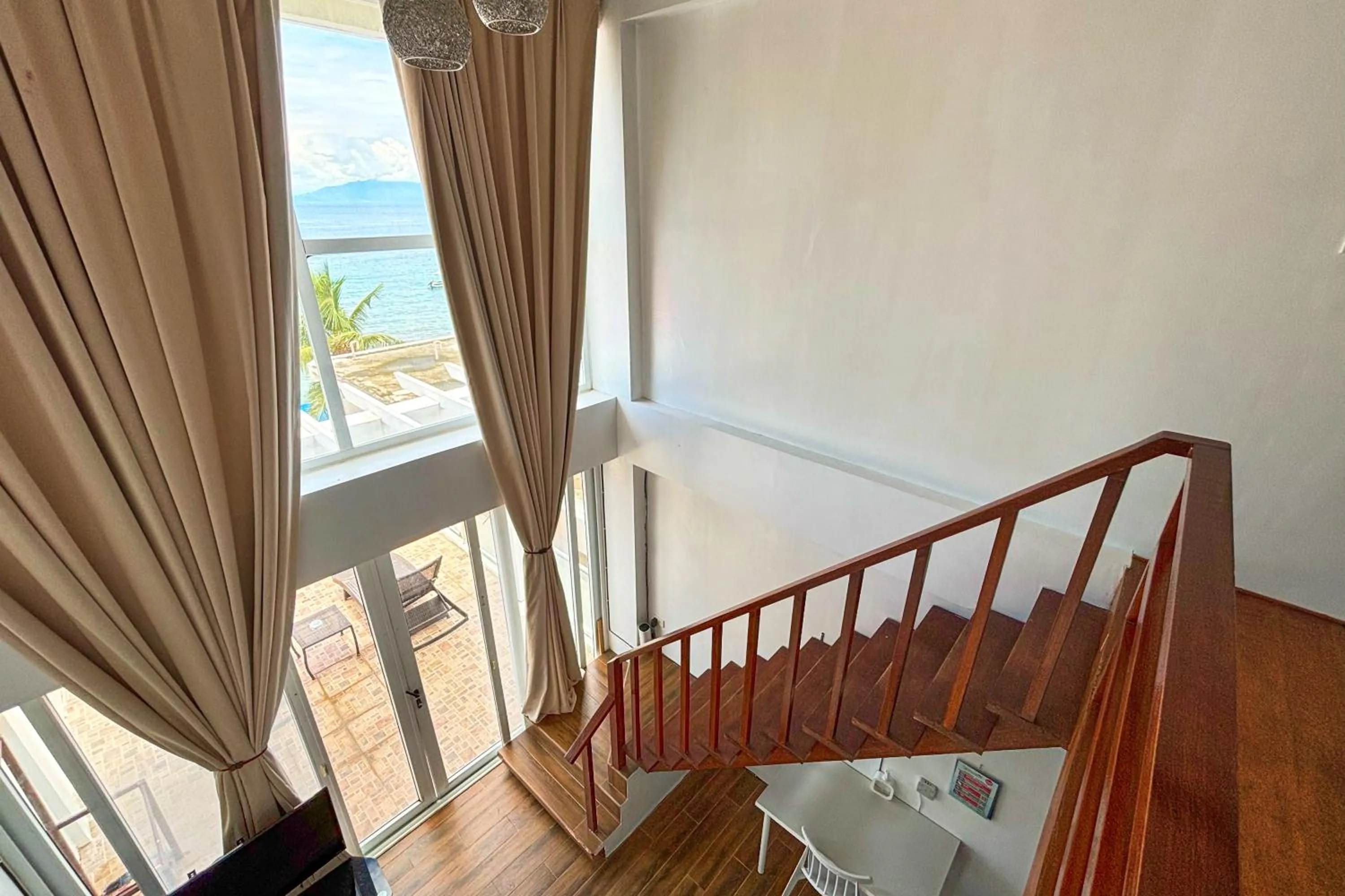 Bed in Arkipelago Divers and Beach Resort