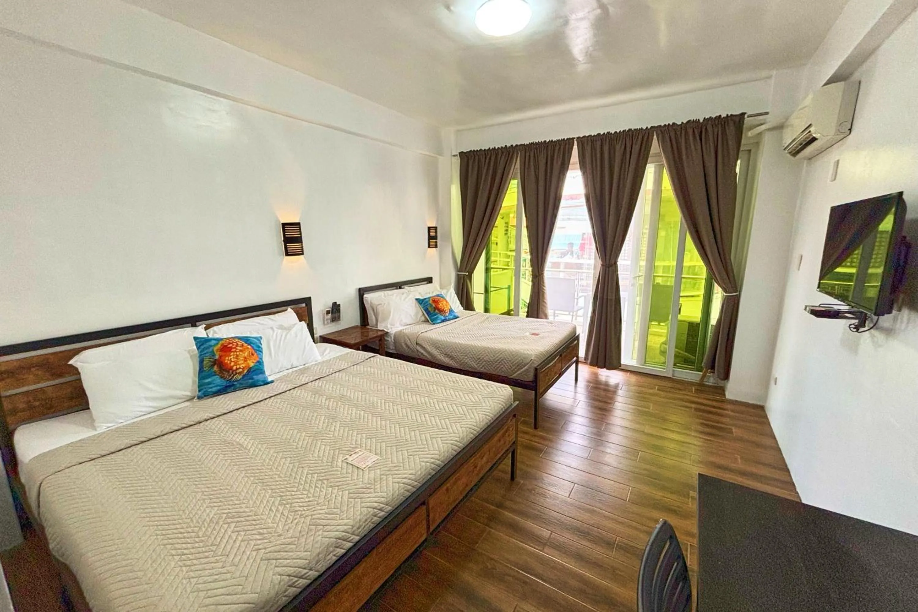 Bed in Arkipelago Divers and Beach Resort