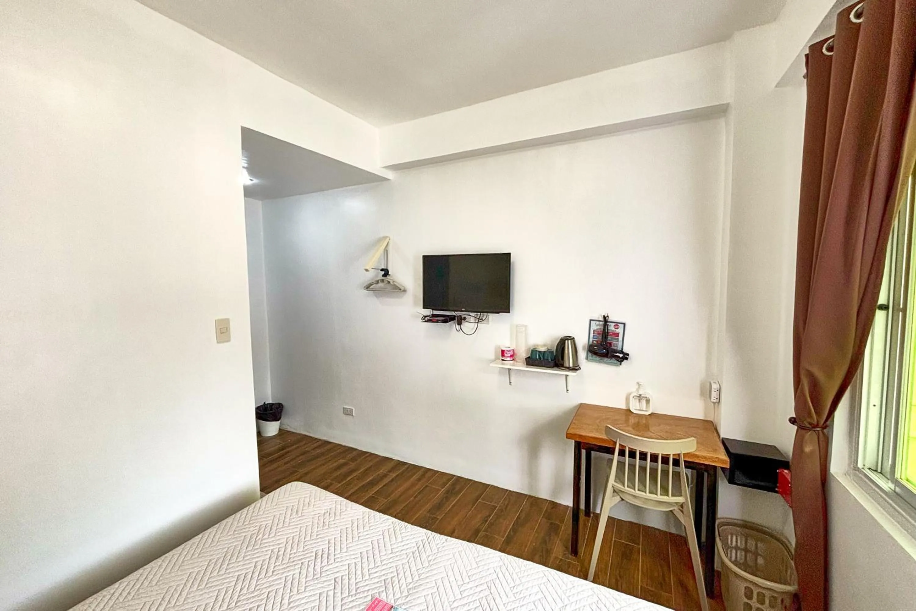 Bed in Arkipelago Divers and Beach Resort