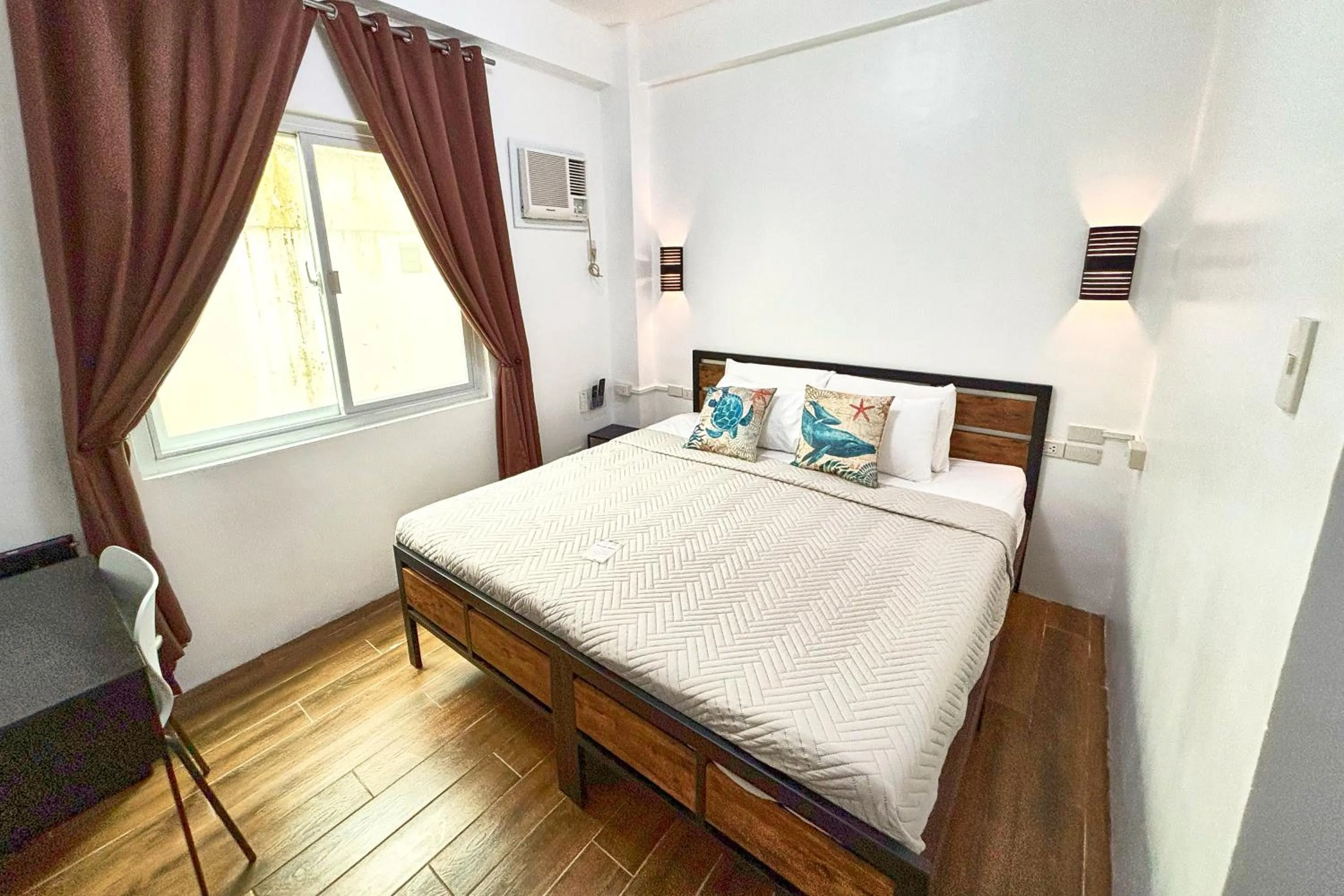 Bed in Arkipelago Divers and Beach Resort