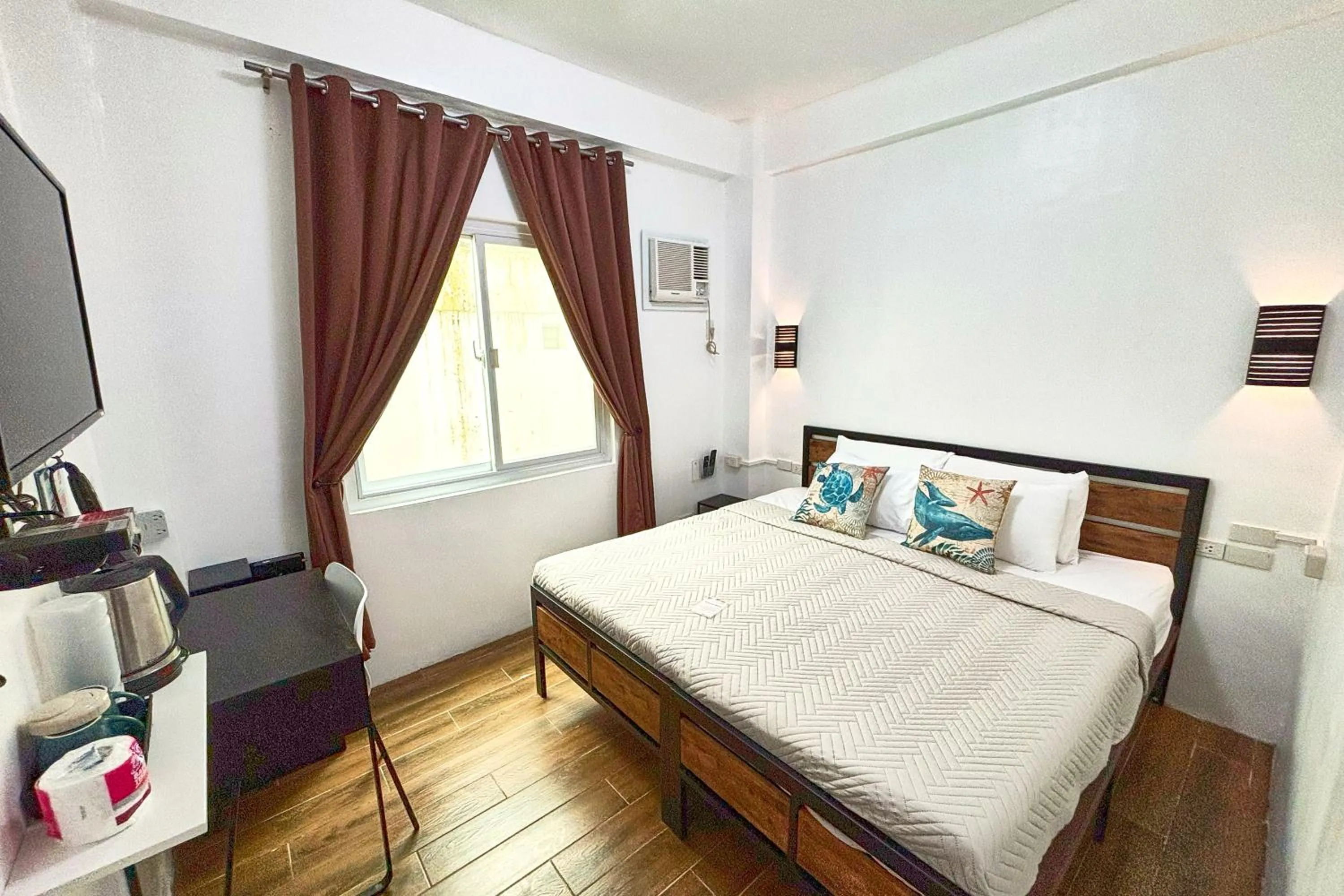 Bed in Arkipelago Divers and Beach Resort