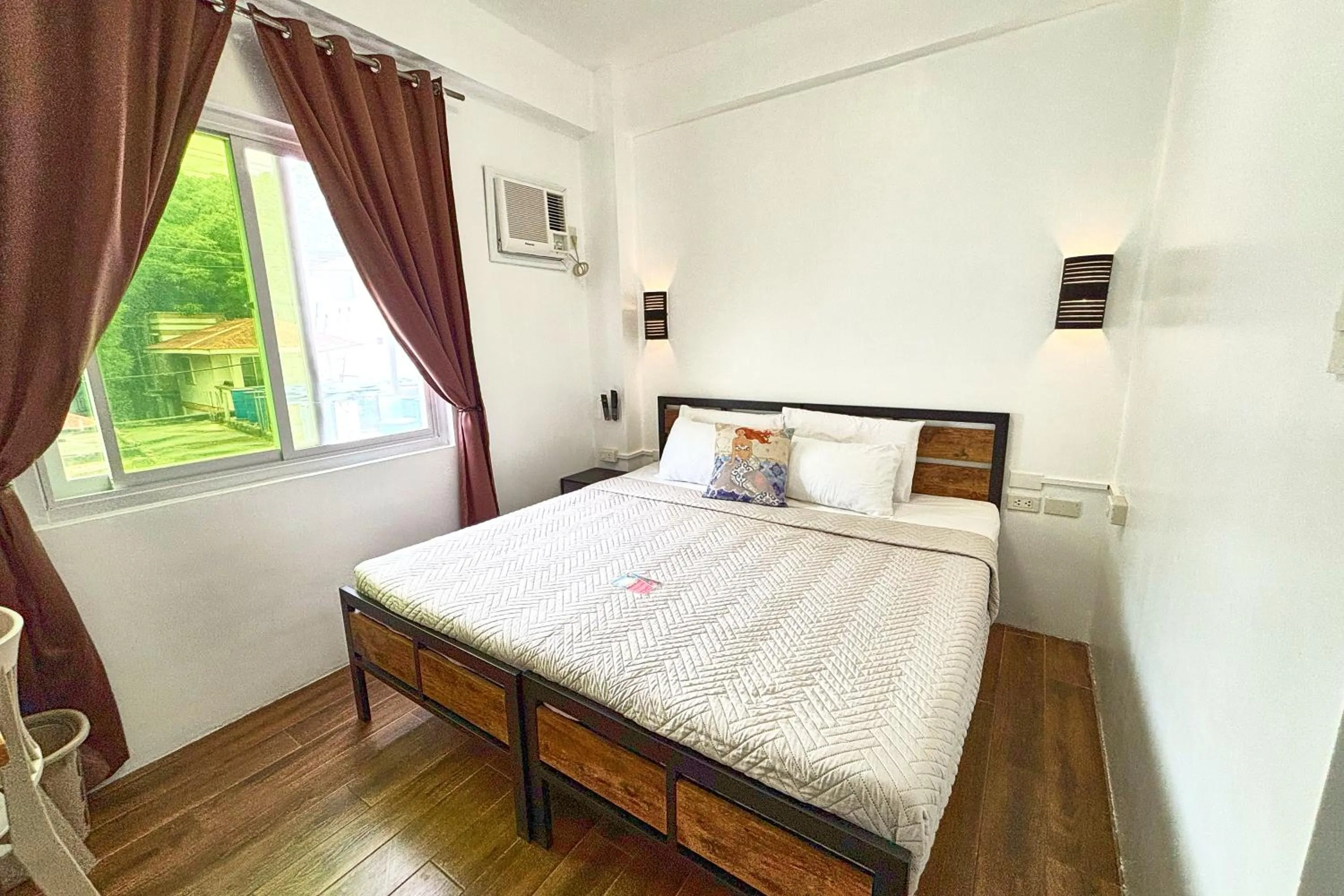 Bed in Arkipelago Divers and Beach Resort