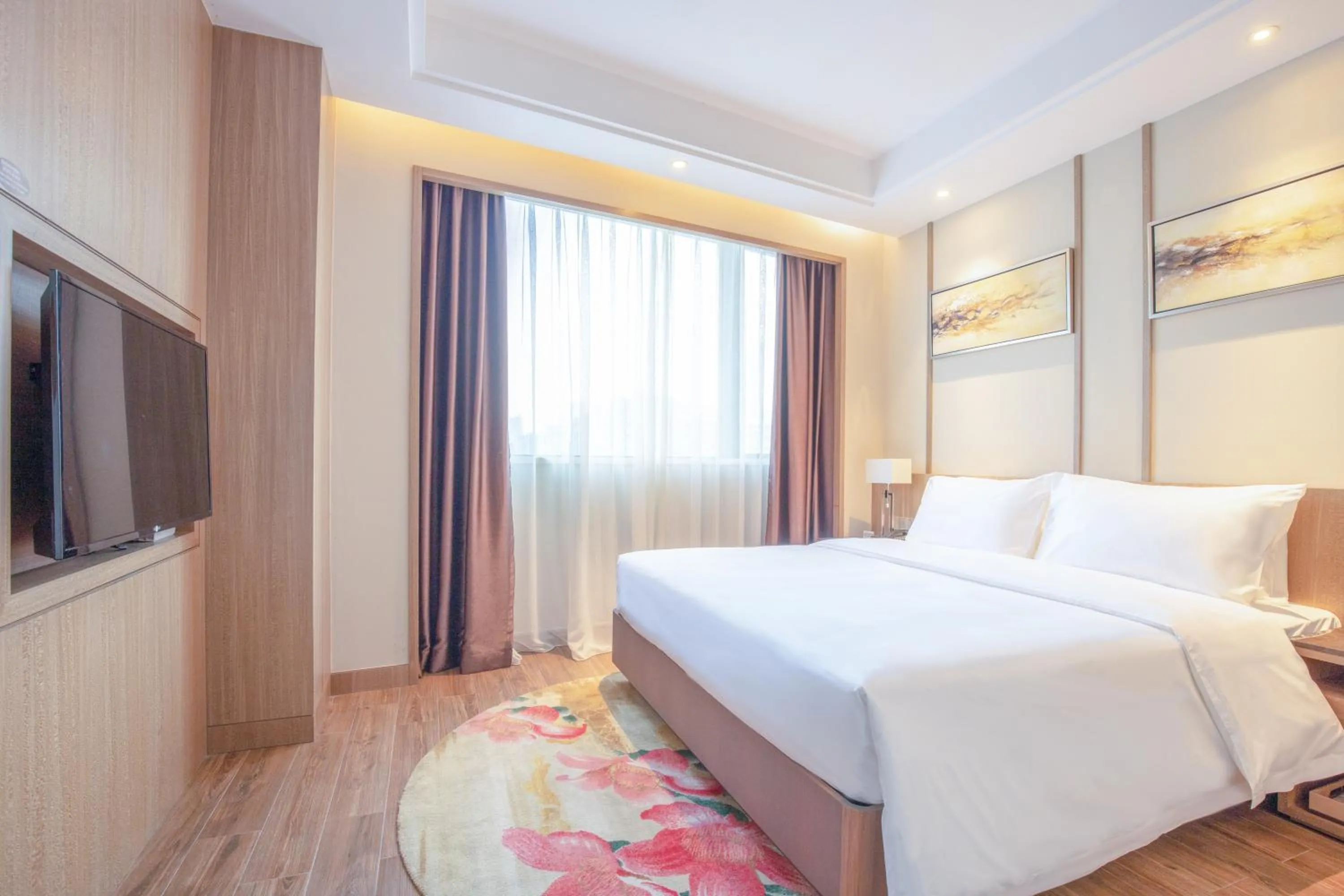 Photo of the whole room in 南国会1站酒店 广交会免费穿梭巴士