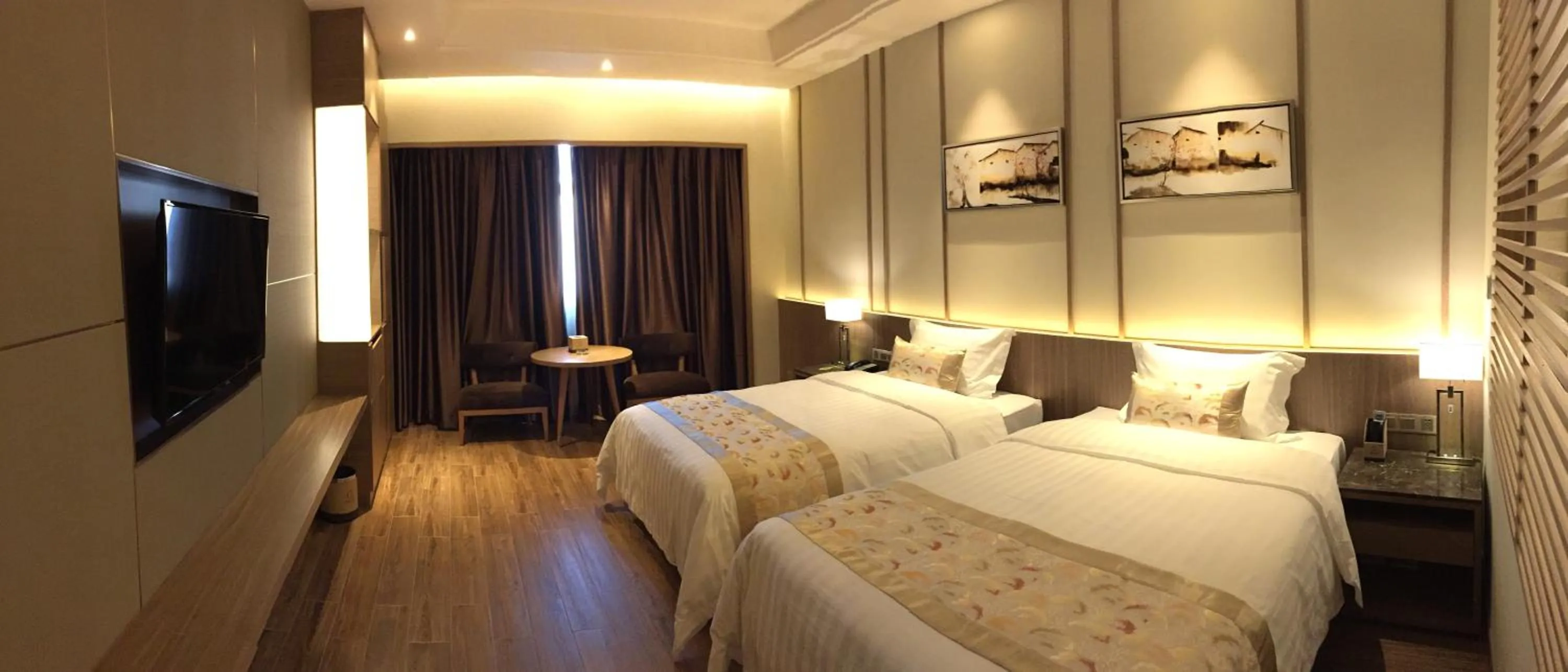 Photo of the whole room in 南国会1站酒店 广交会免费穿梭巴士