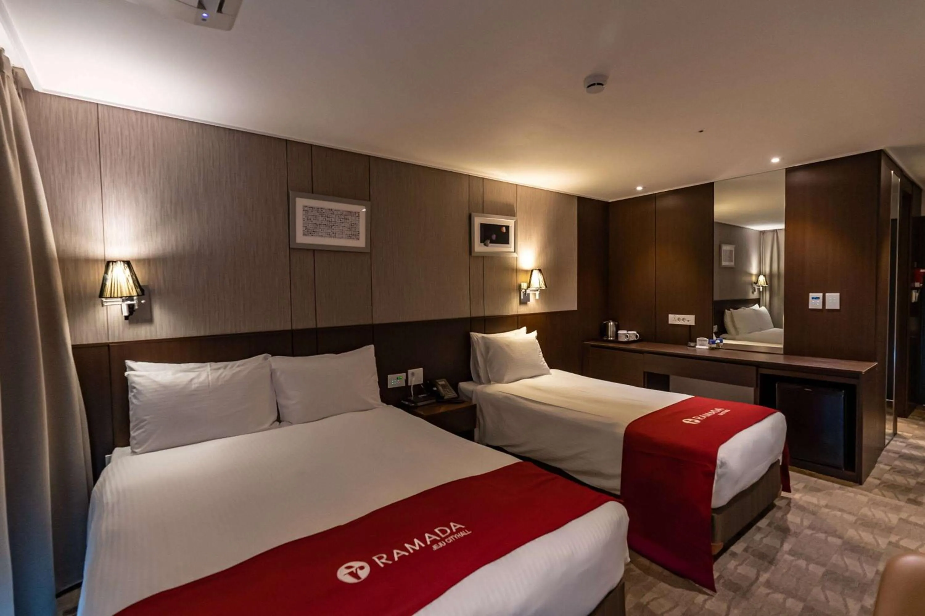 Photo of the whole room, Bed in Ramada by Wyndham Jeju City Hall