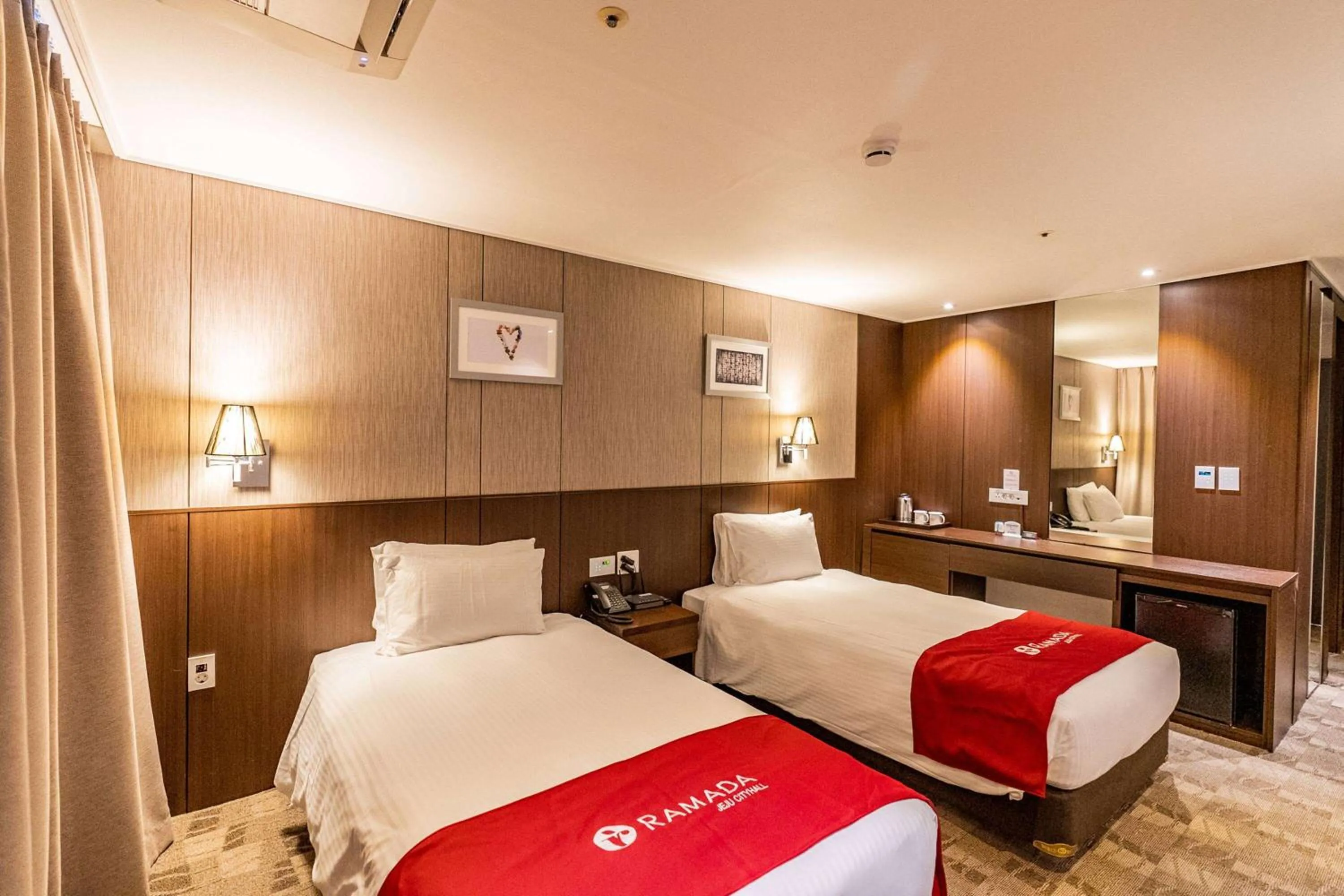 Photo of the whole room, Bed in Ramada by Wyndham Jeju City Hall