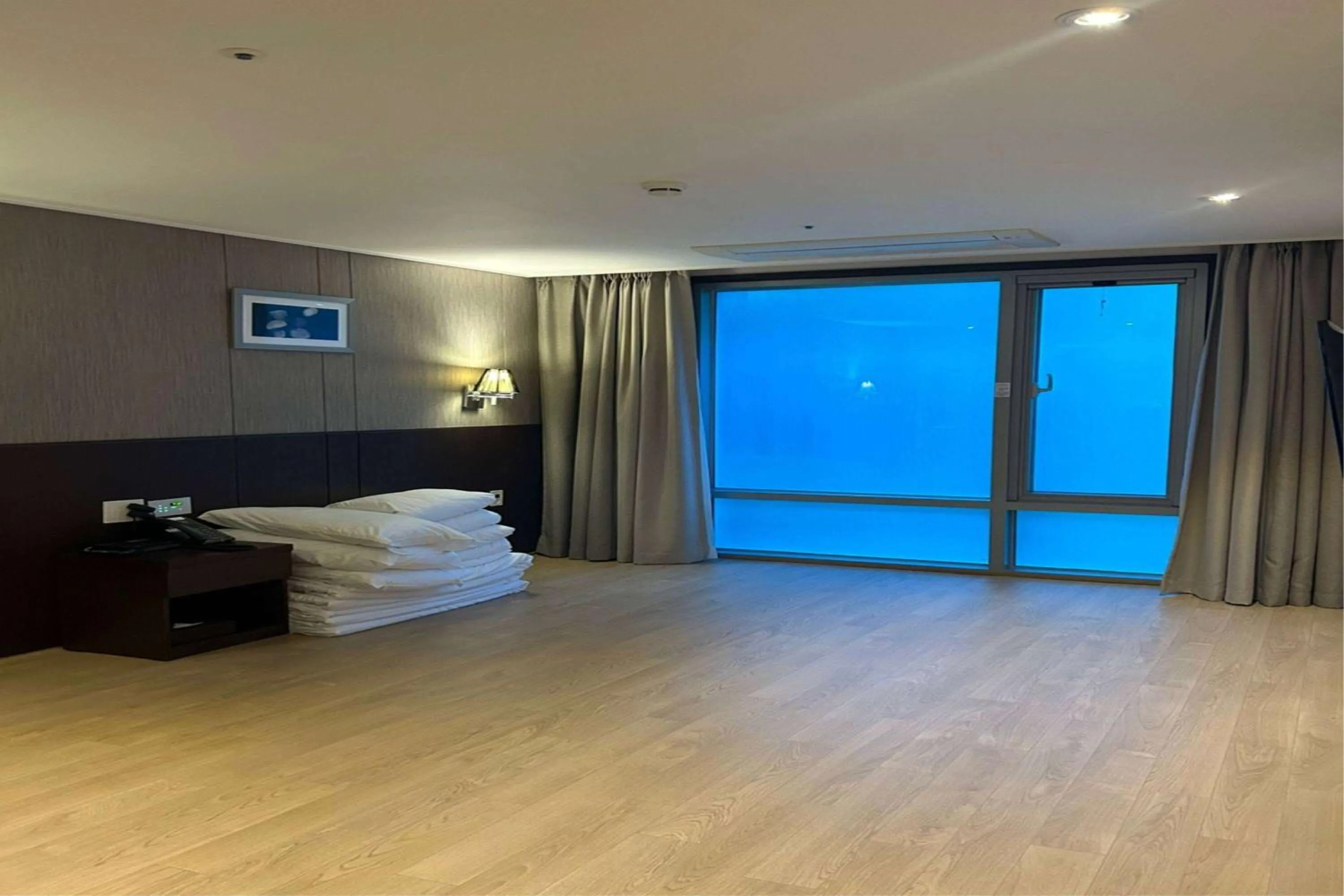Photo of the whole room, Bed in Ramada by Wyndham Jeju City Hall