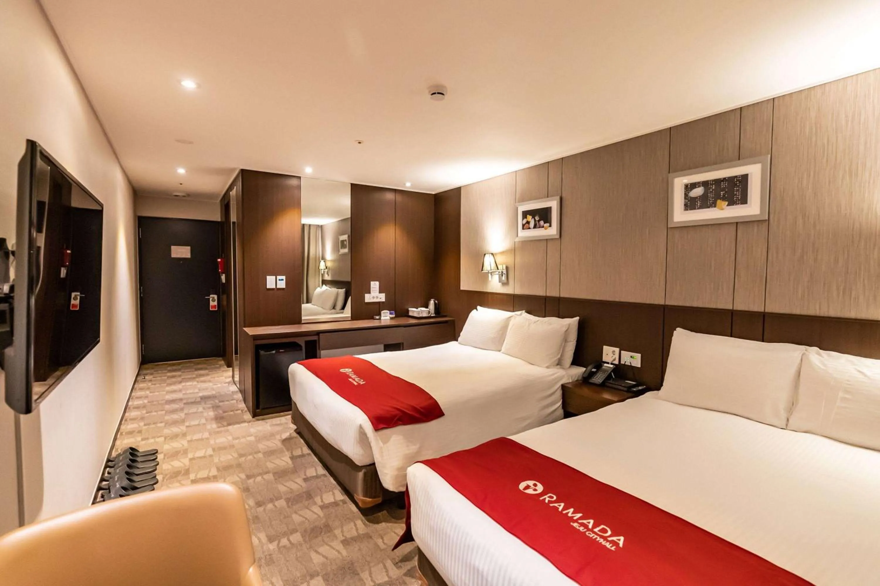 Photo of the whole room, Bed in Ramada by Wyndham Jeju City Hall