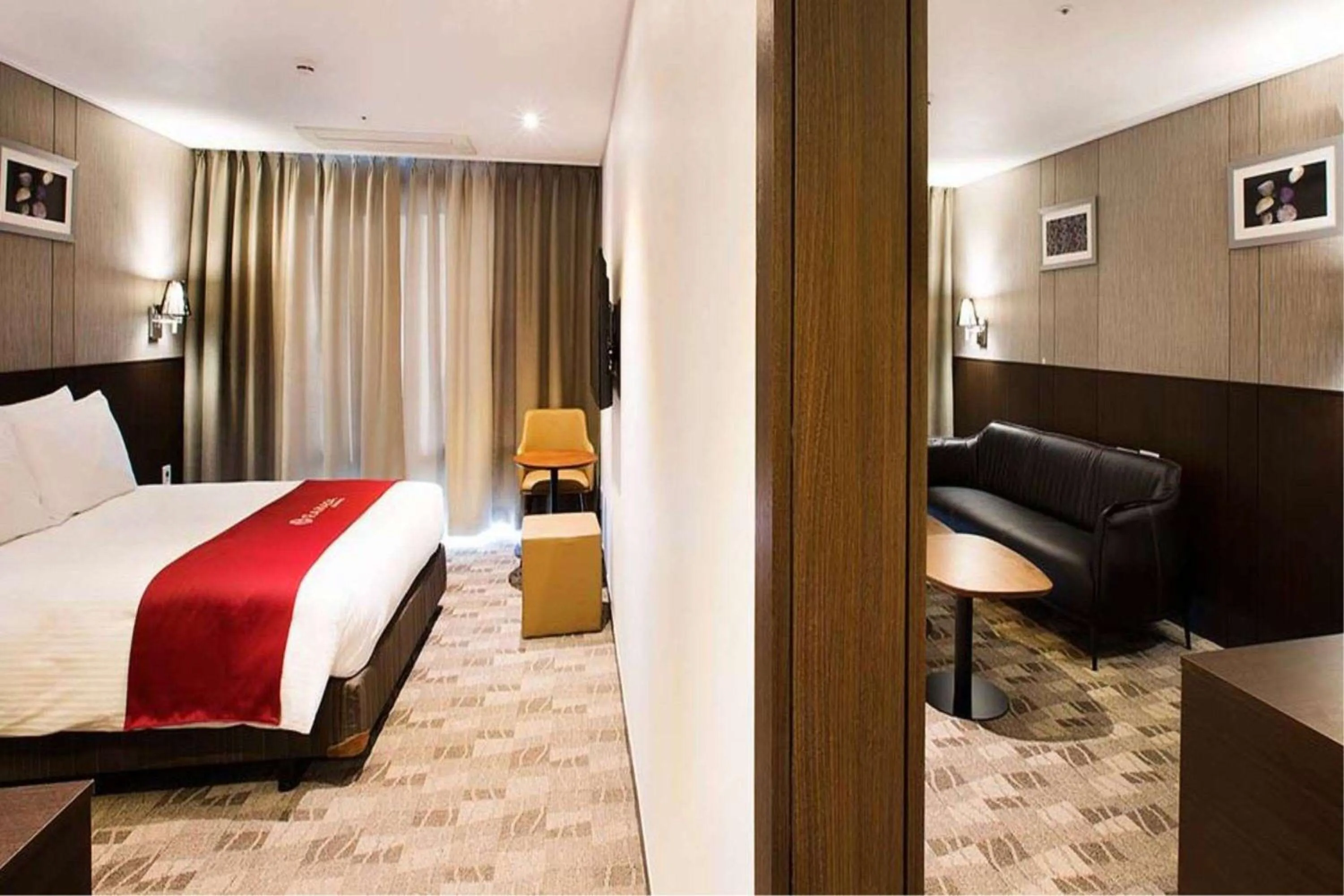 Photo of the whole room, Bed in Ramada by Wyndham Jeju City Hall