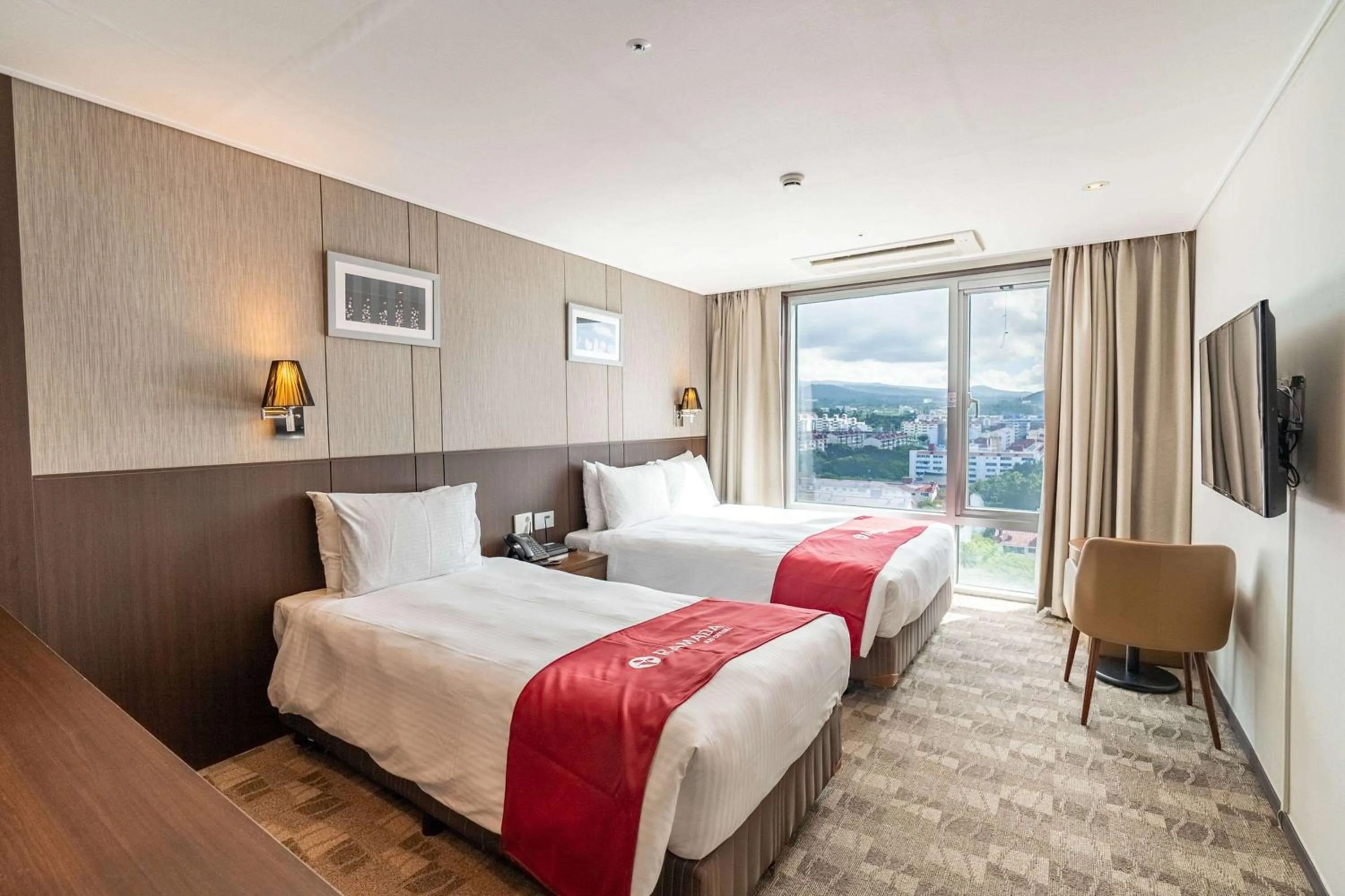 Photo of the whole room, Bed in Ramada by Wyndham Jeju City Hall