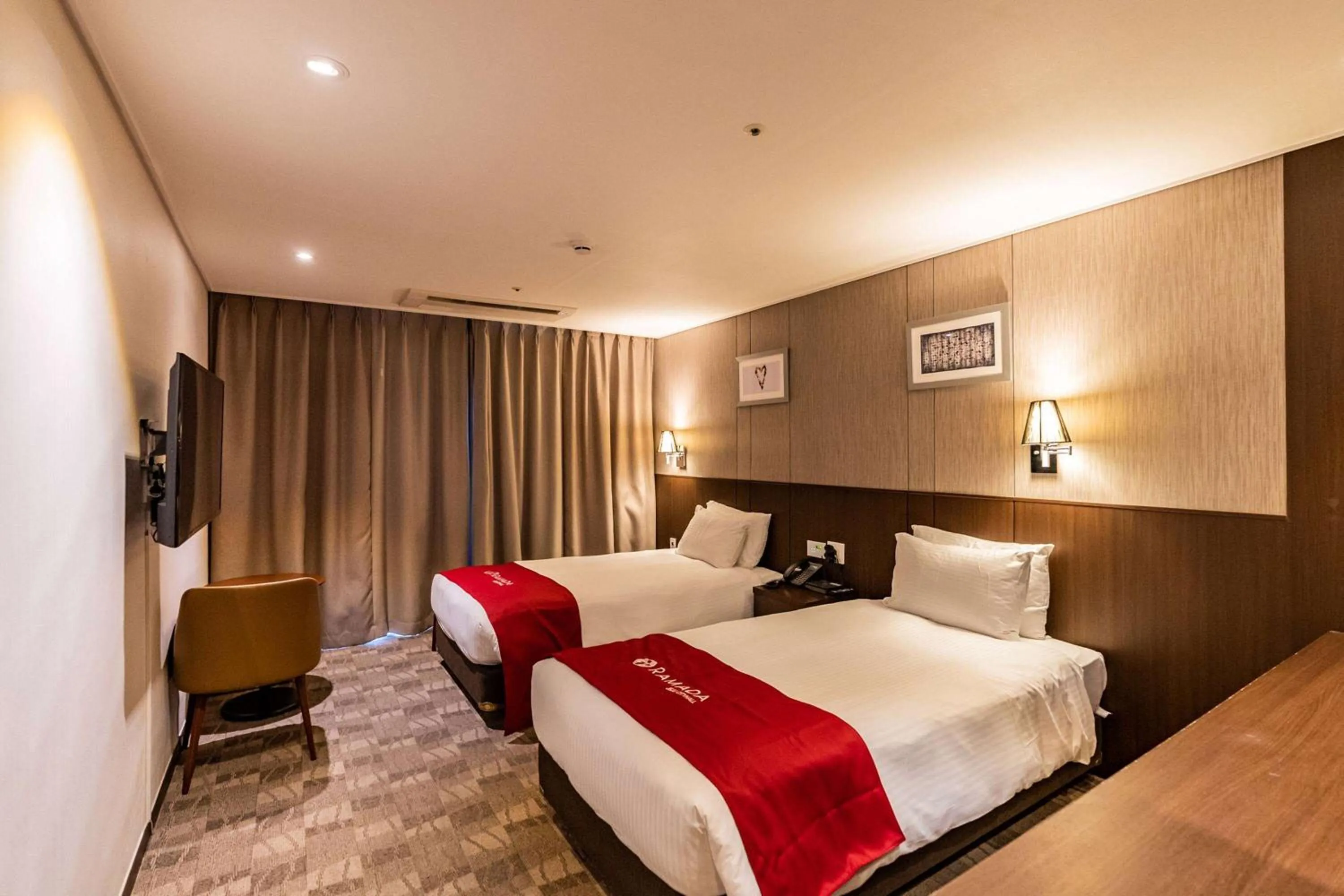 Photo of the whole room, Bed in Ramada by Wyndham Jeju City Hall