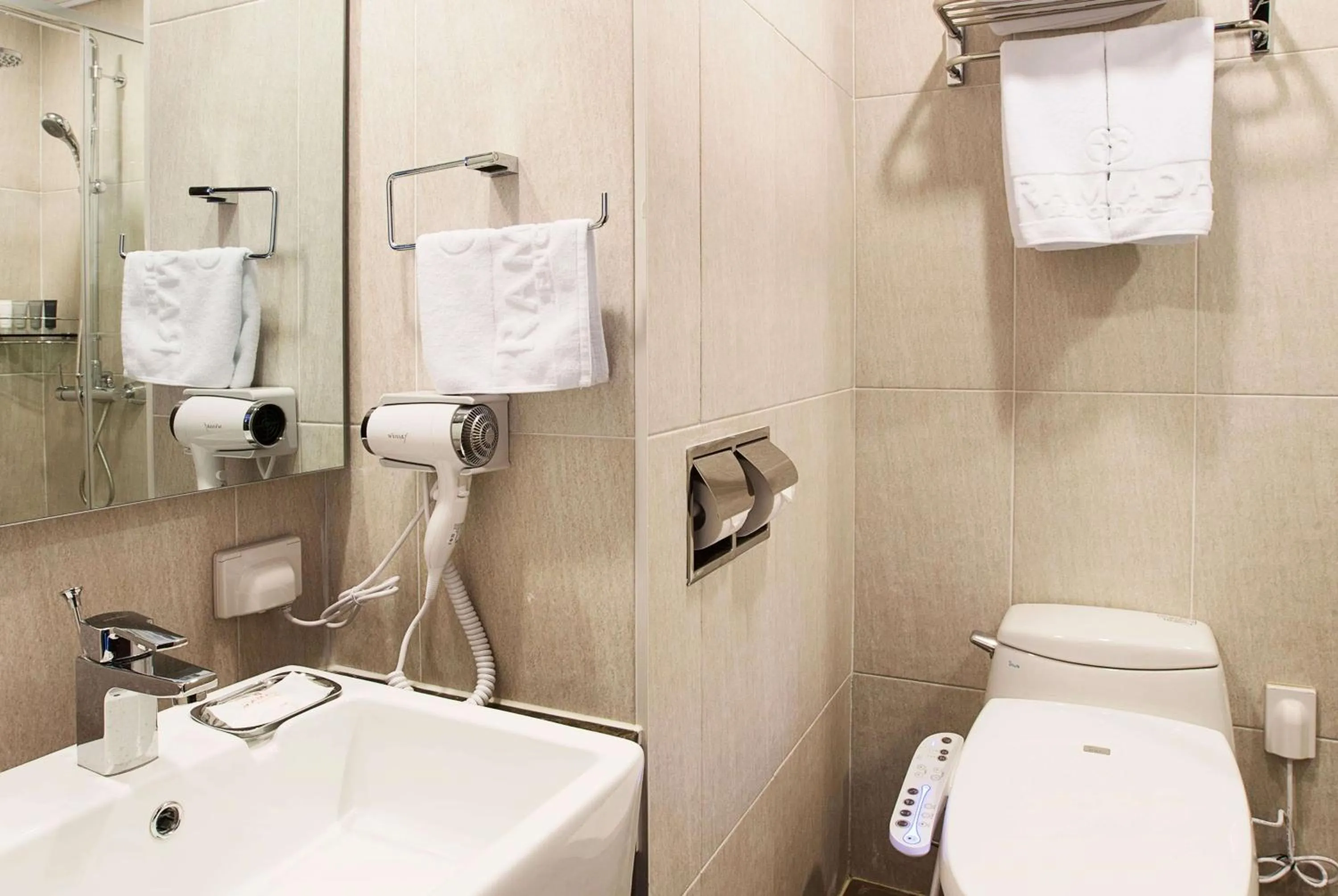 Toilet in Ramada by Wyndham Jeju City Hall