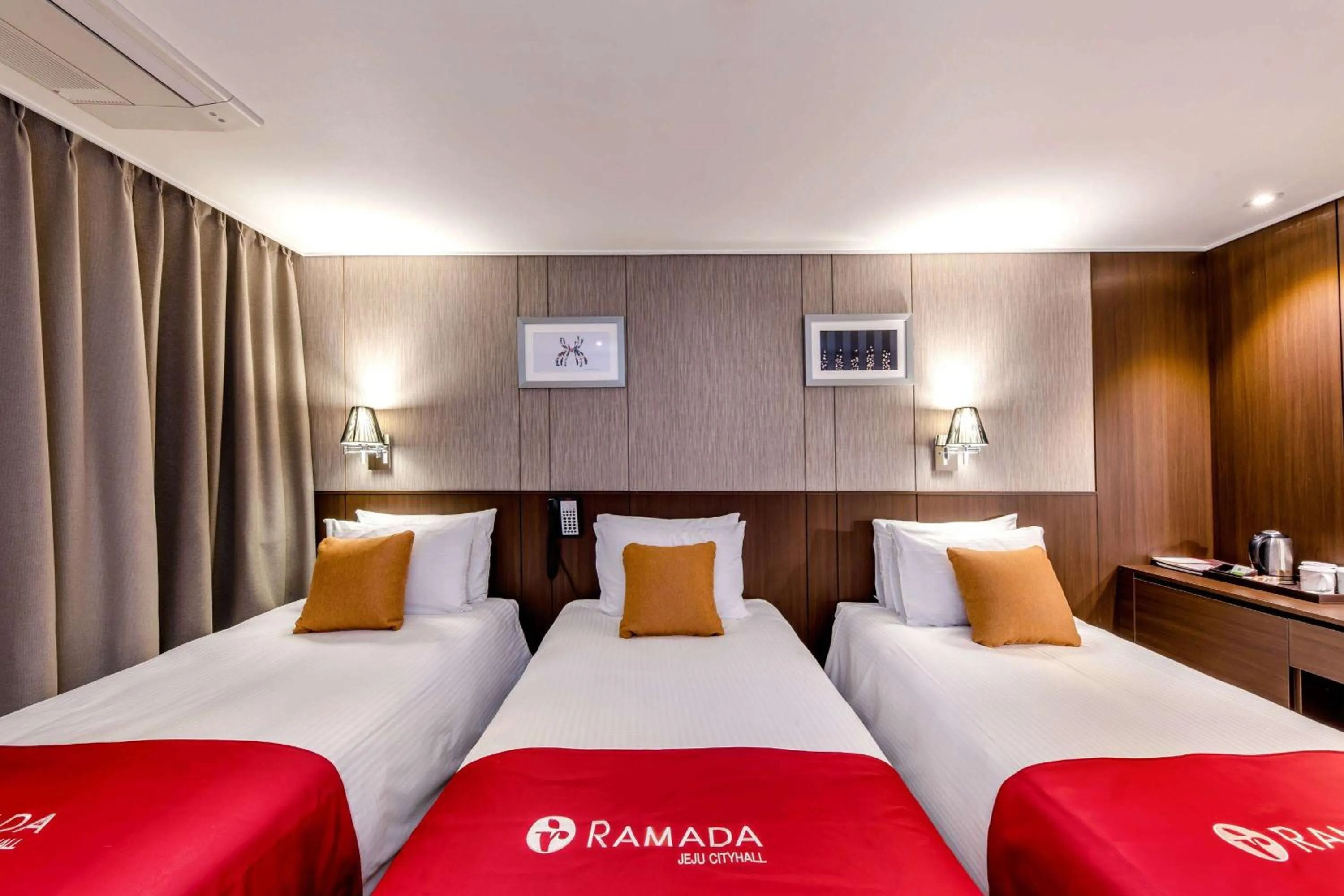 Photo of the whole room, Bed in Ramada by Wyndham Jeju City Hall