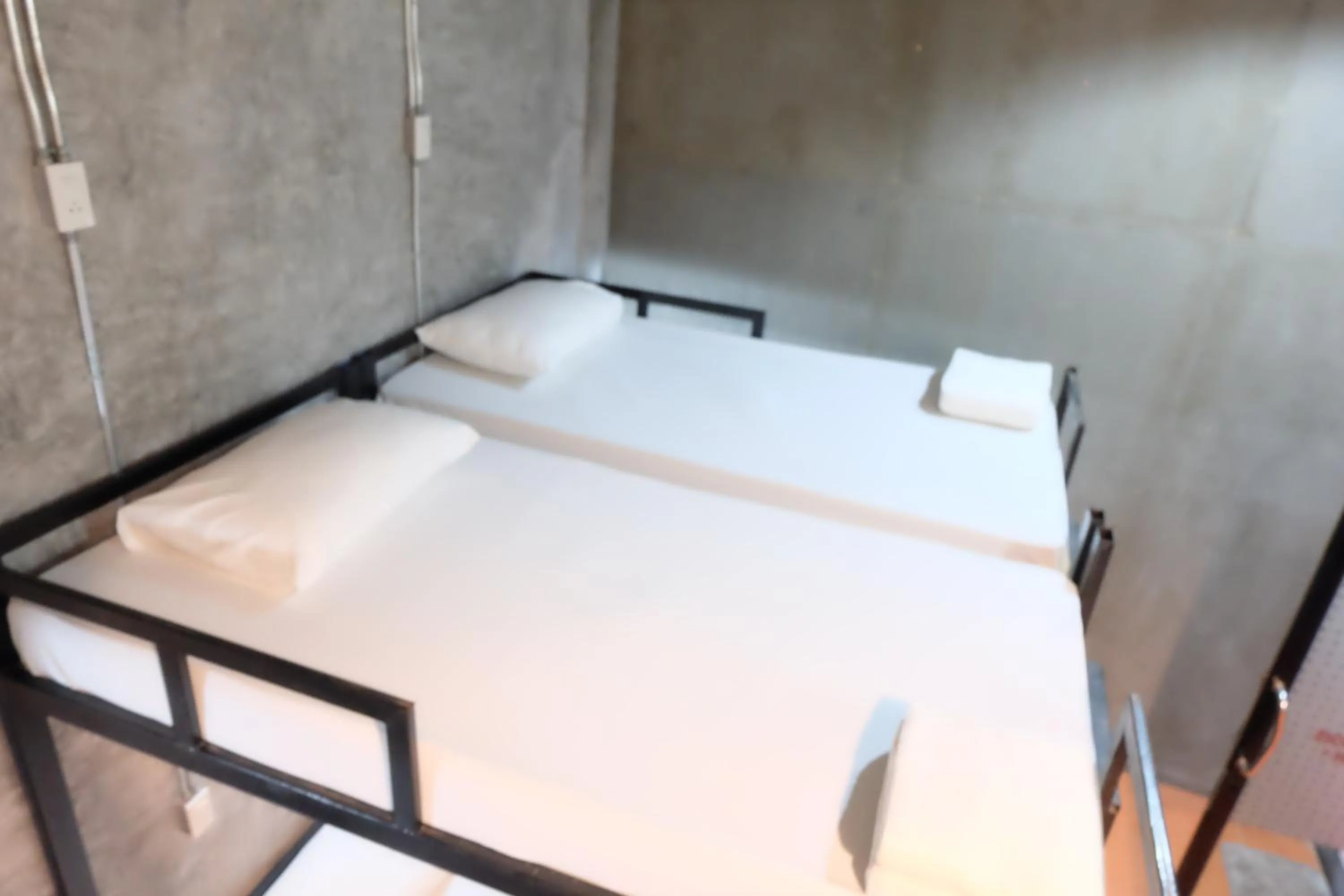 Bed in White Jail at Koh Tao Hostel