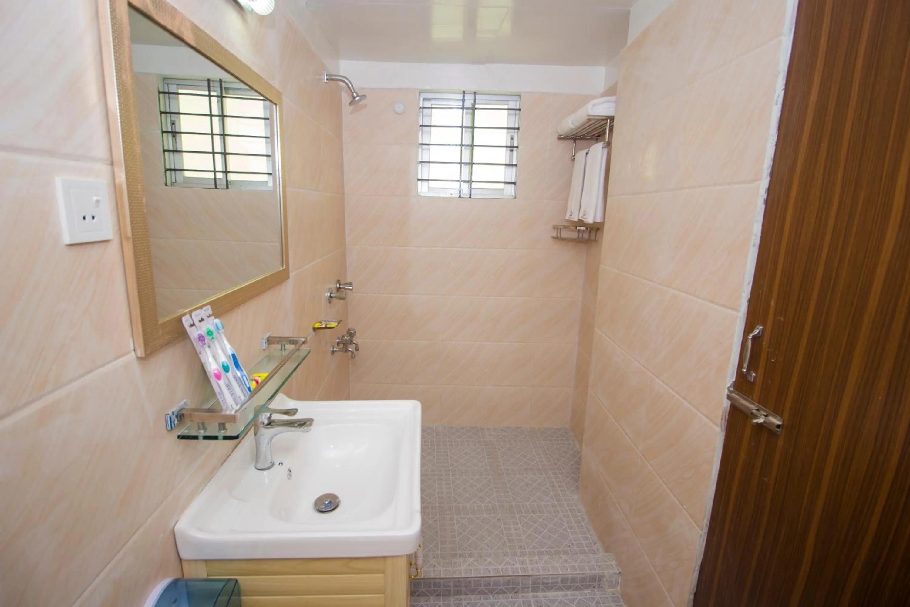 Shower in Hotel Progati Inn Ltd.