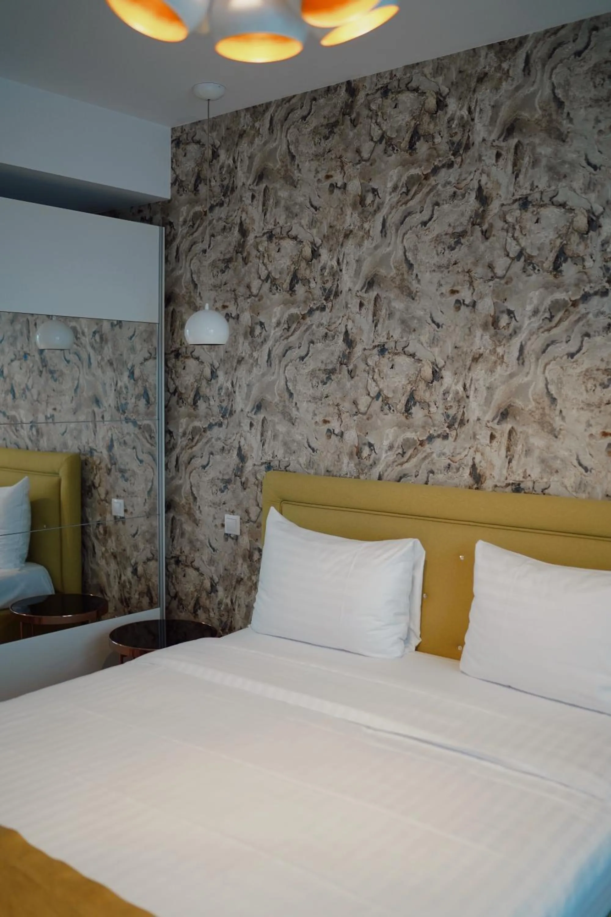 Bed in UBA Accommodation Aparthotel