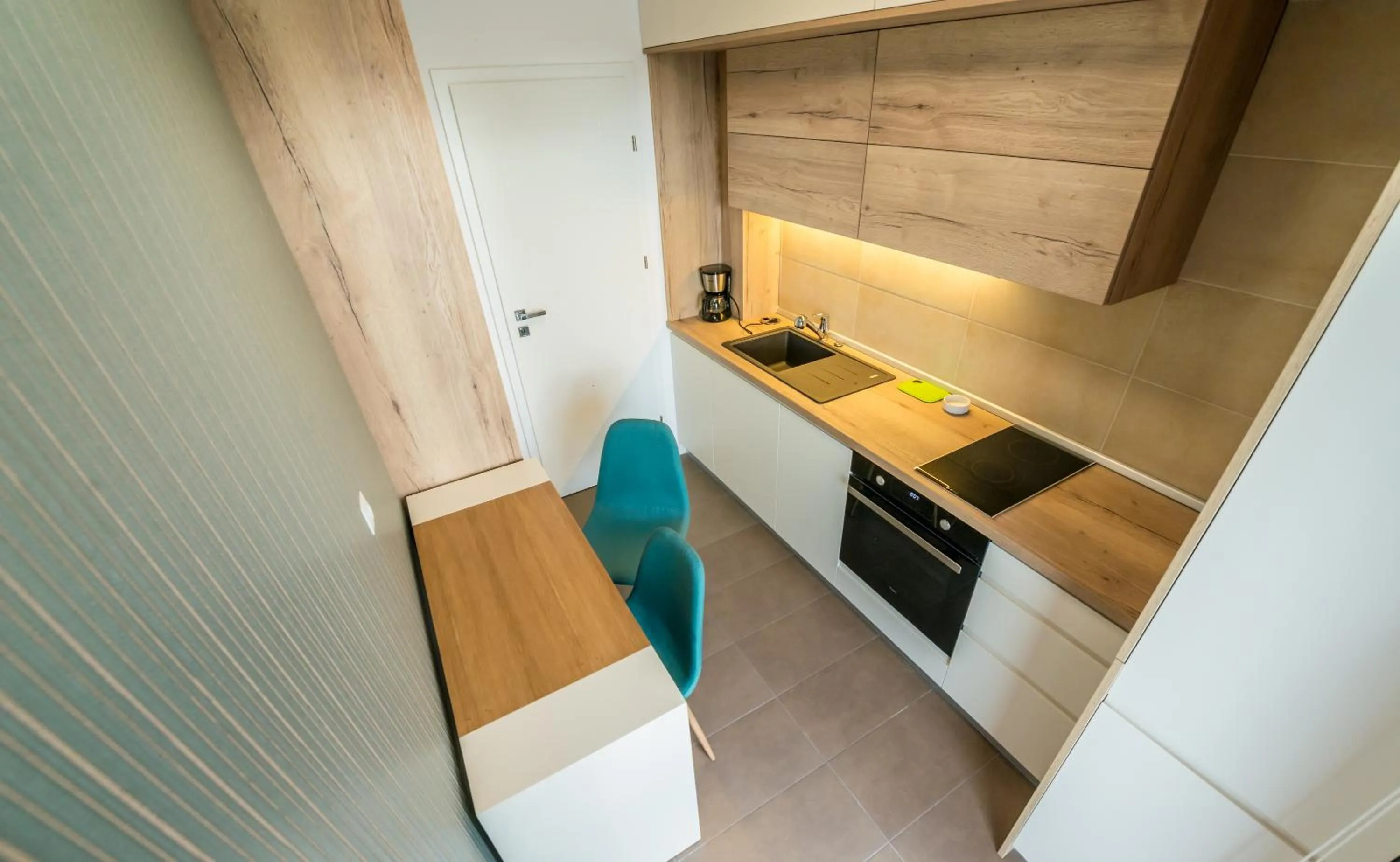 Kitchen or kitchenette in UBA Accommodation Aparthotel