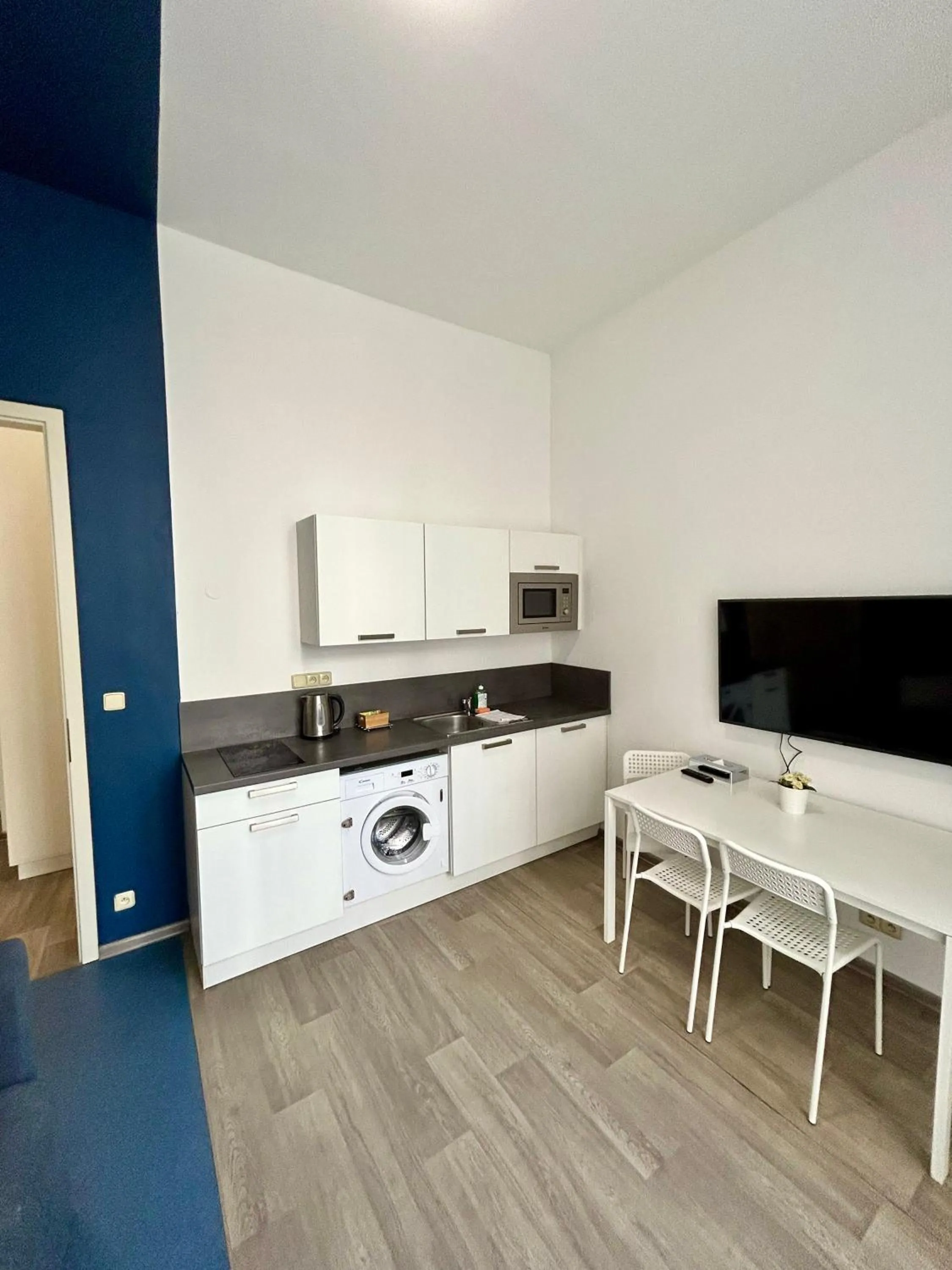 Kitchen or kitchenette in Alveo Suites