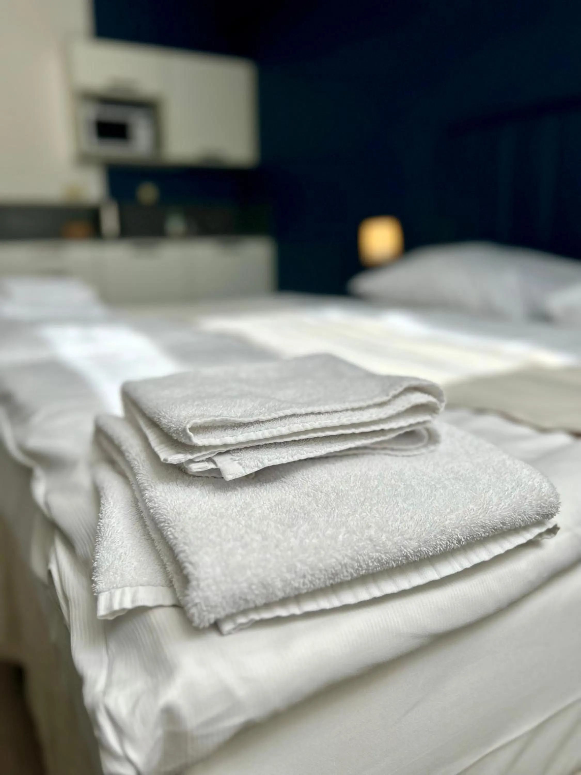 towels, Bed in Alveo Suites