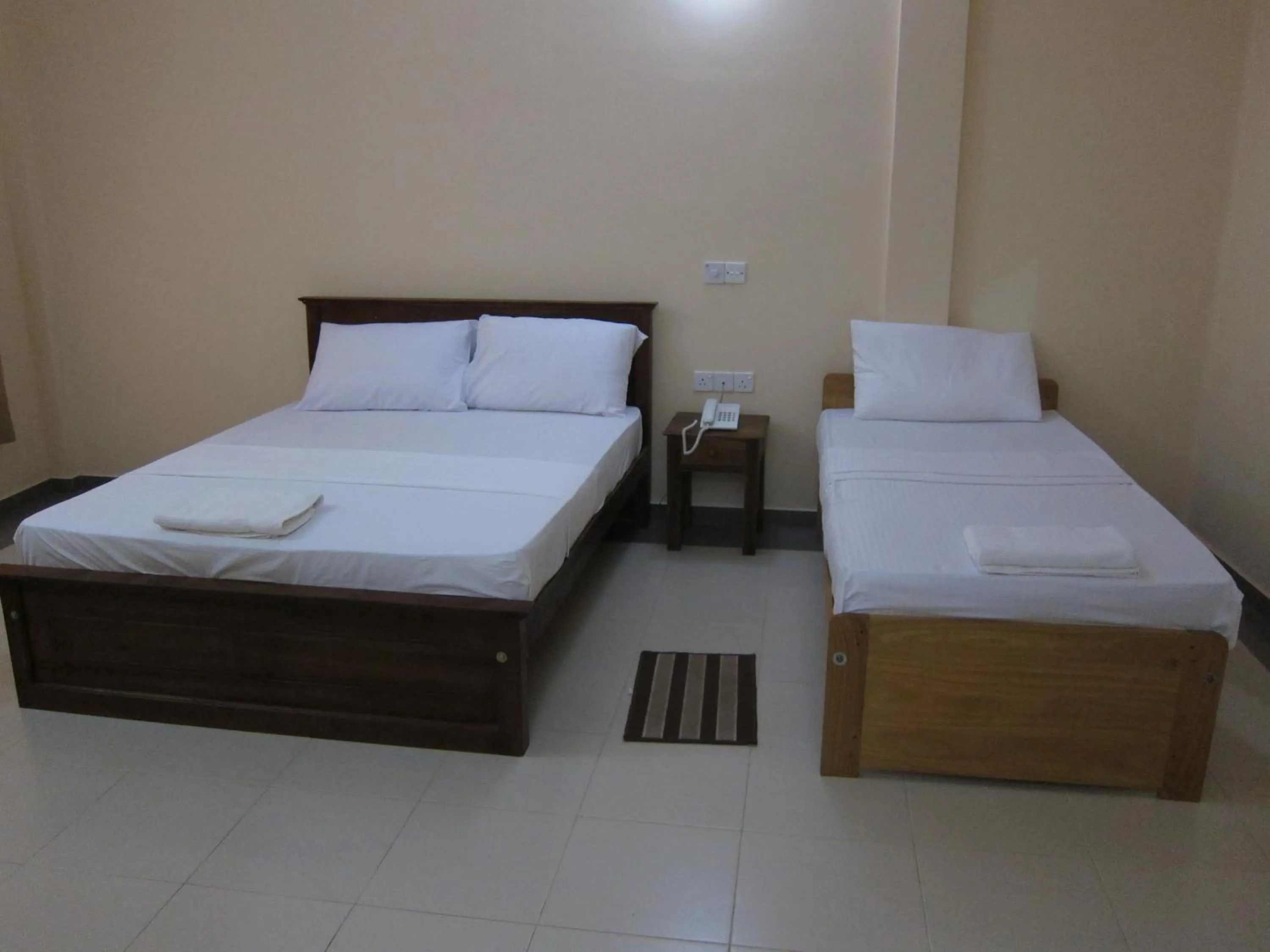 Bed in Hotel Oviya