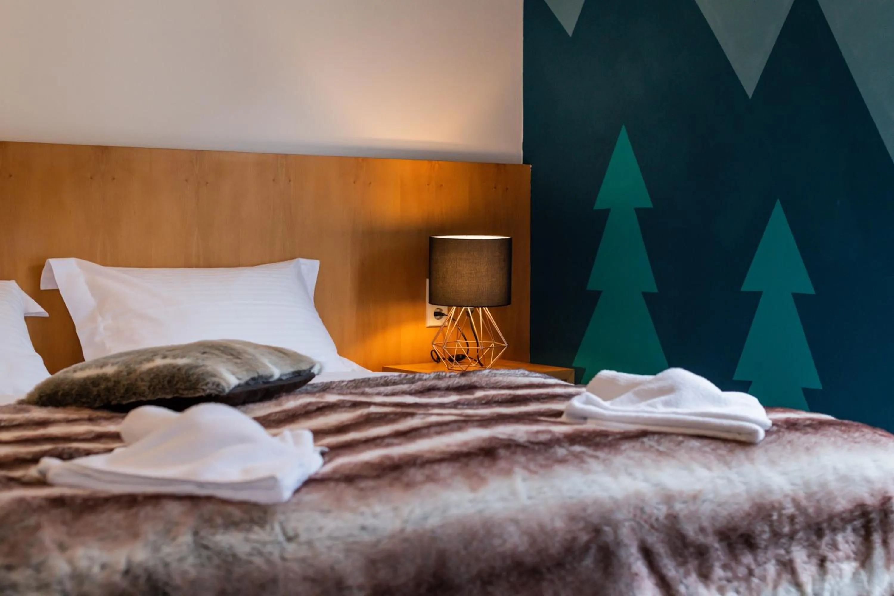 Bed in Ibex Lodge